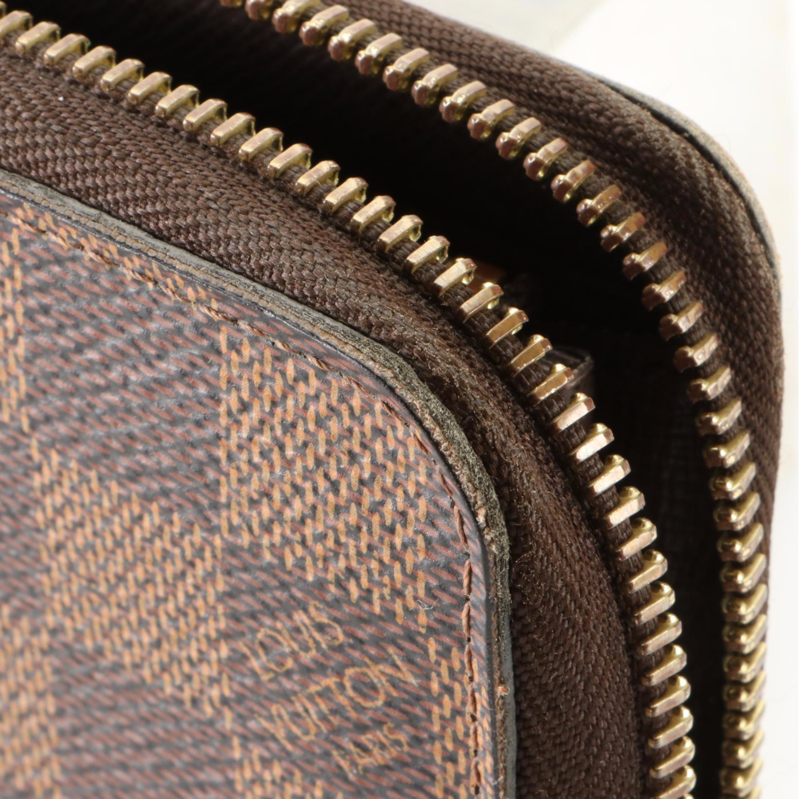 Louis Vuitton Zippy Wallet in Damier Ebene Canvas