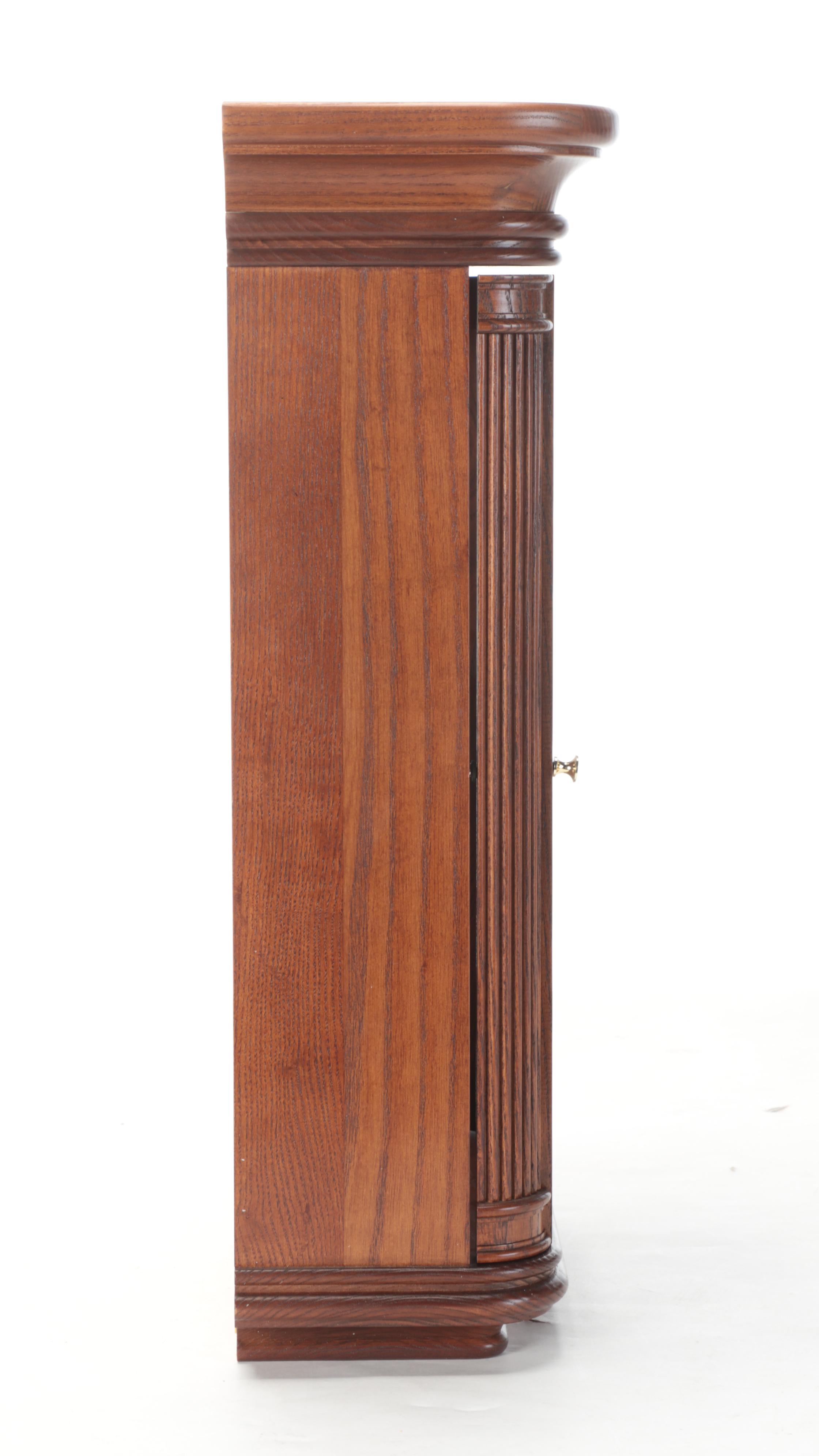 Howard Miller Oak Case Wall Clock