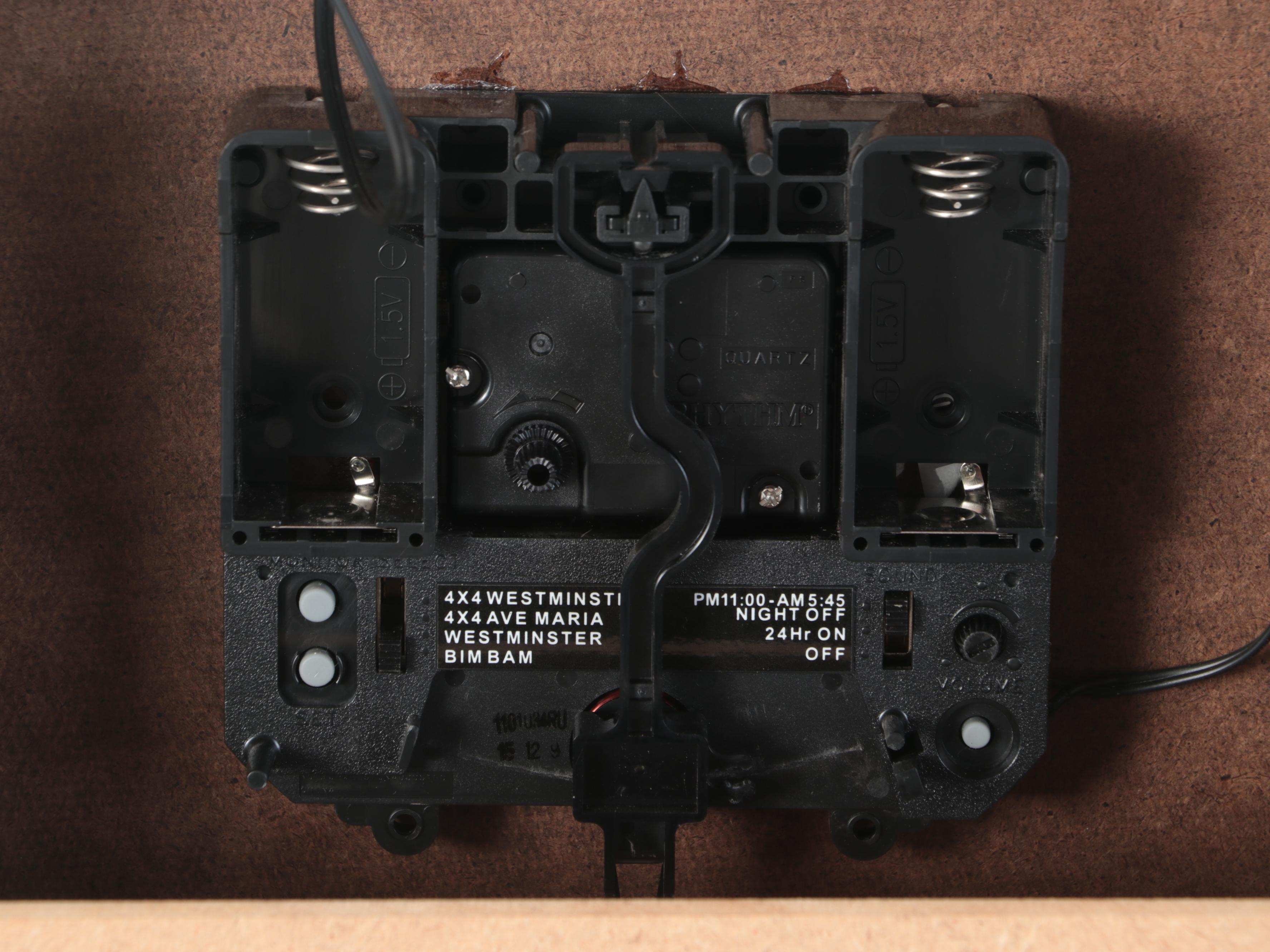 Howard Miller Oak Case Wall Clock