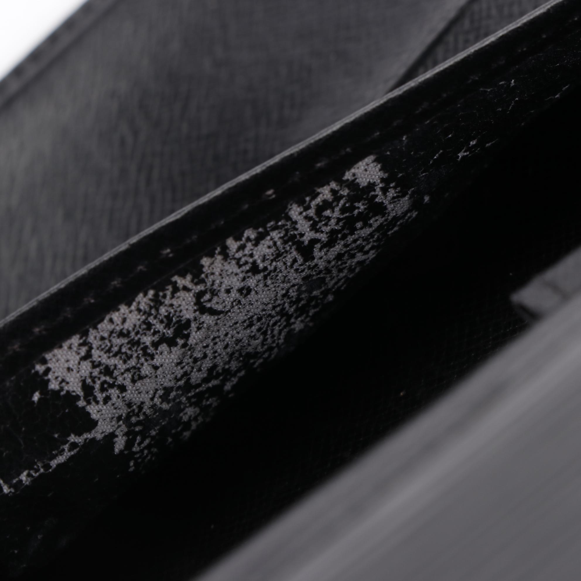 Louis Vuitton Porte-Tresór International Wallet in Black Epi Leather