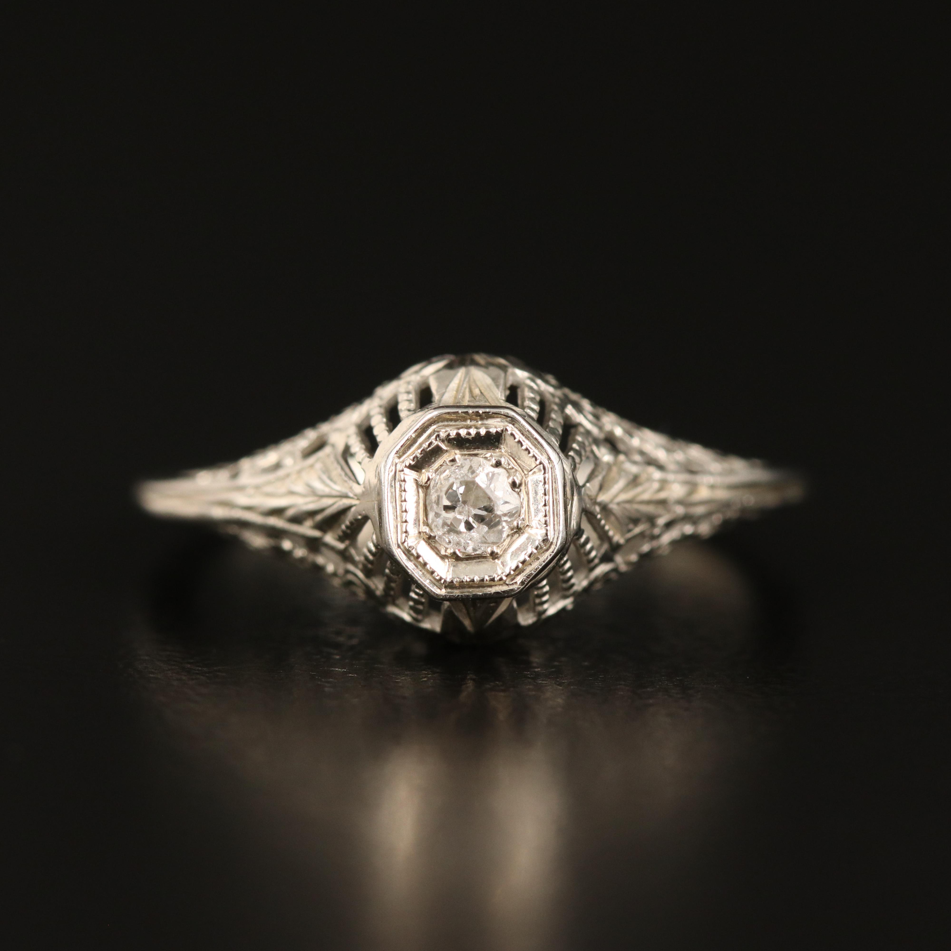 18K 0.06 CT Diamond Ring