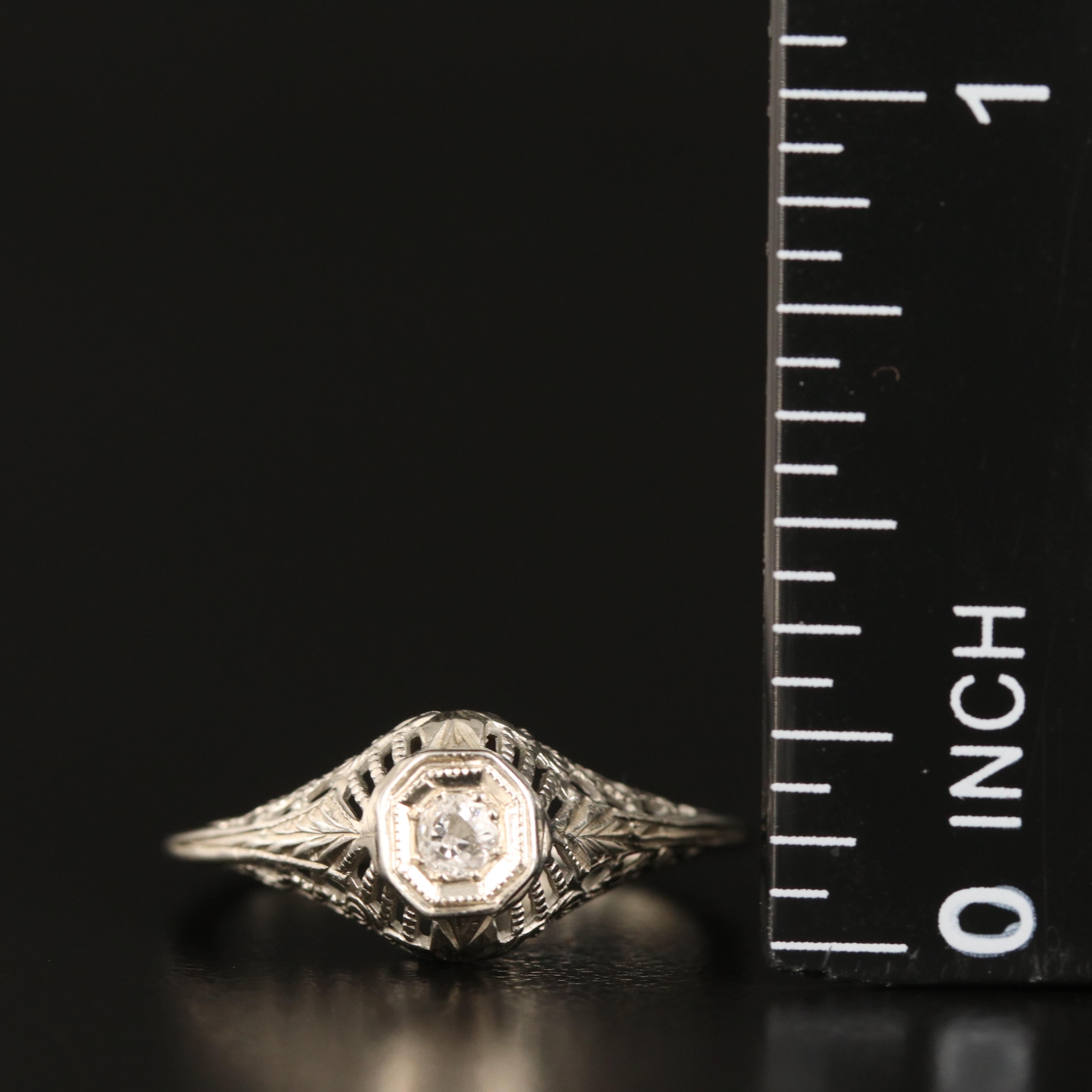 18K 0.06 CT Diamond Ring