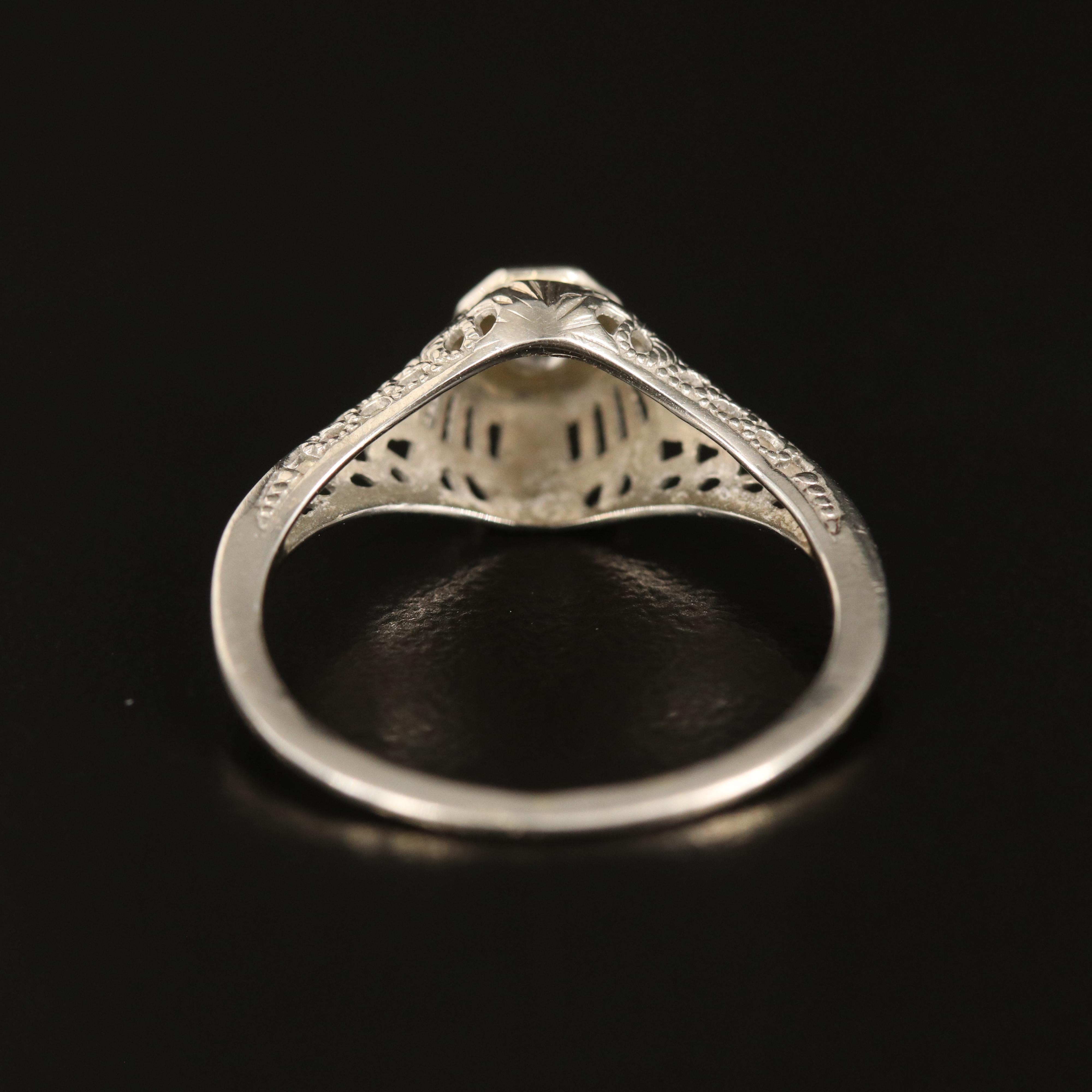 18K 0.06 CT Diamond Ring