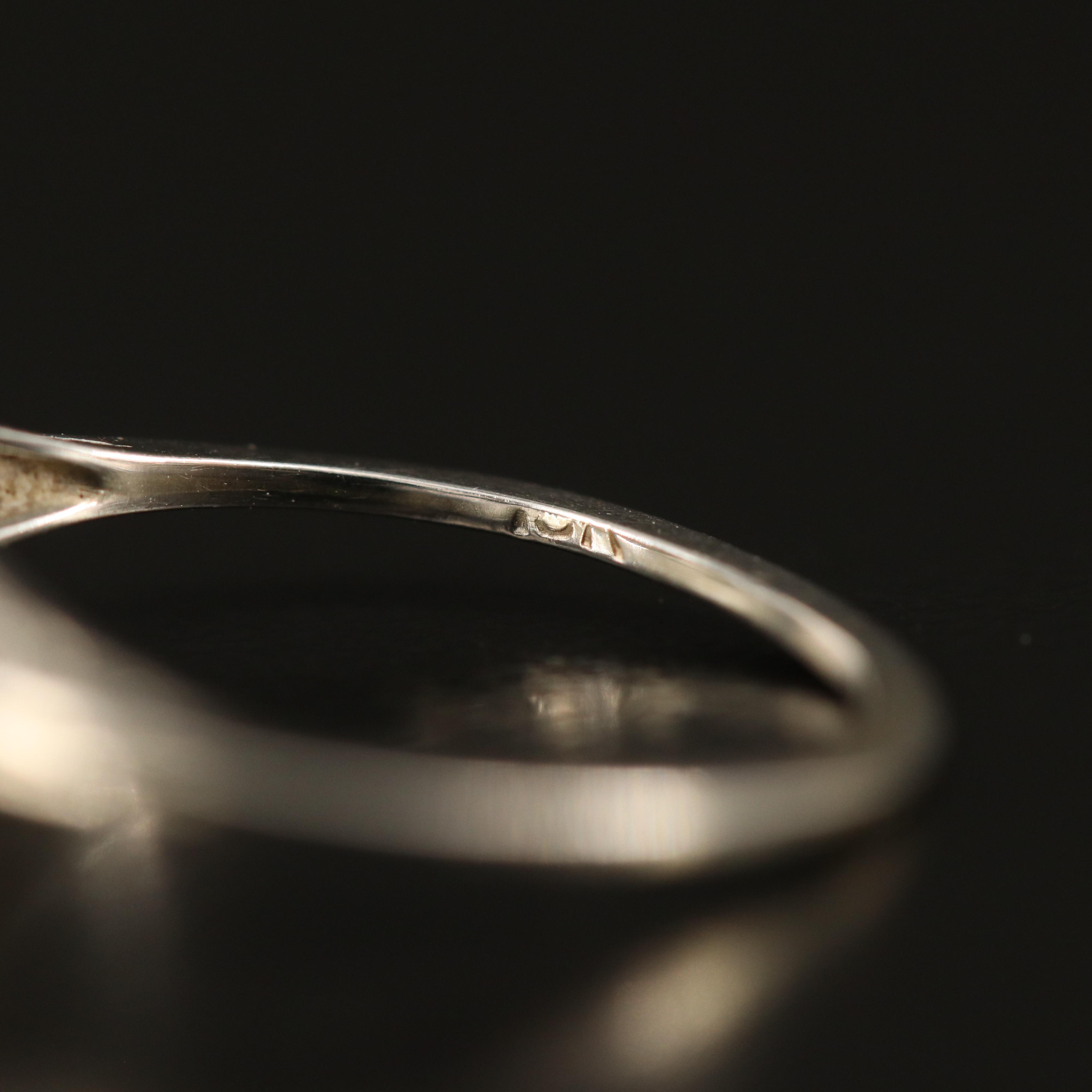 18K 0.06 CT Diamond Ring