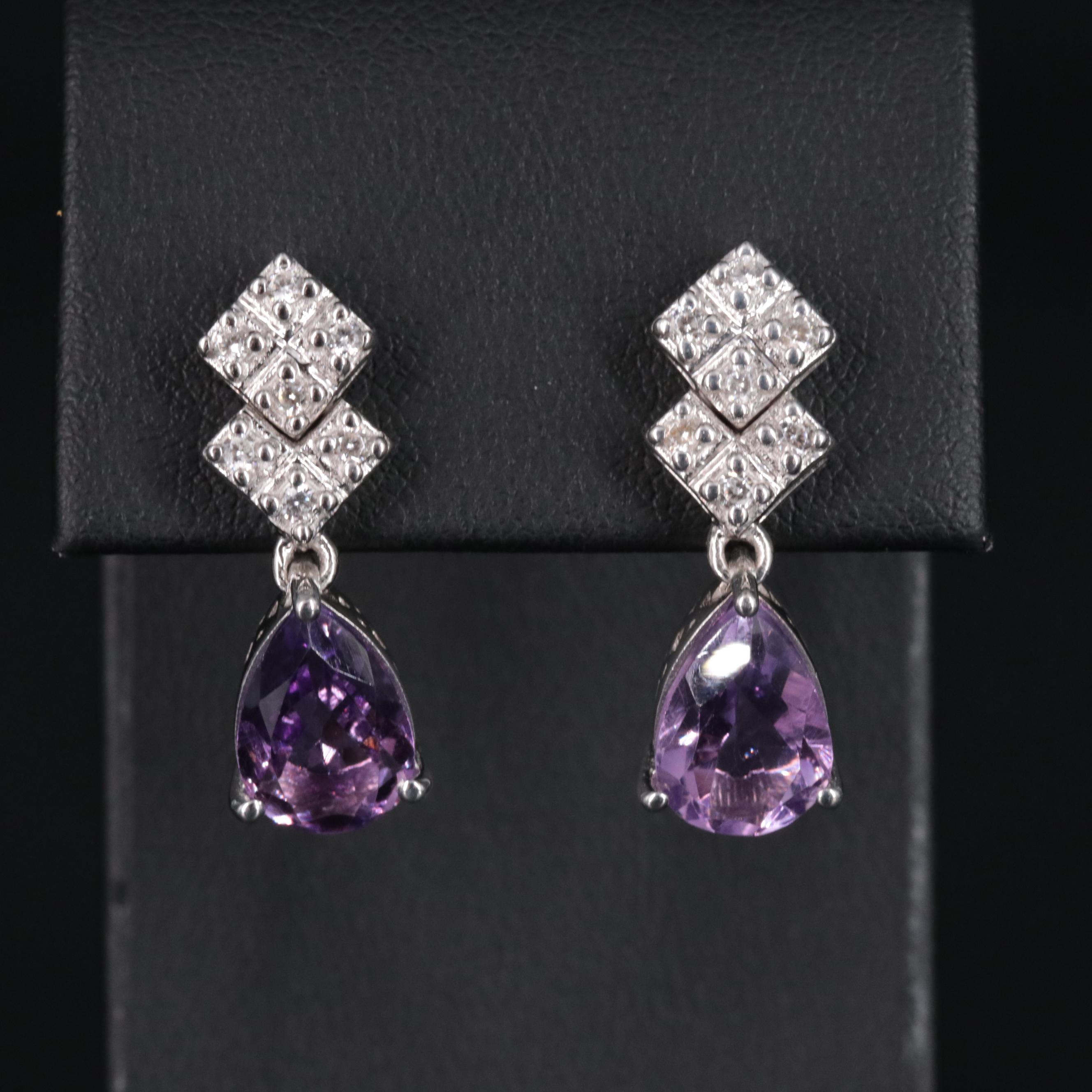 Sterling Silver Drop Earrings Featuring Amethyst