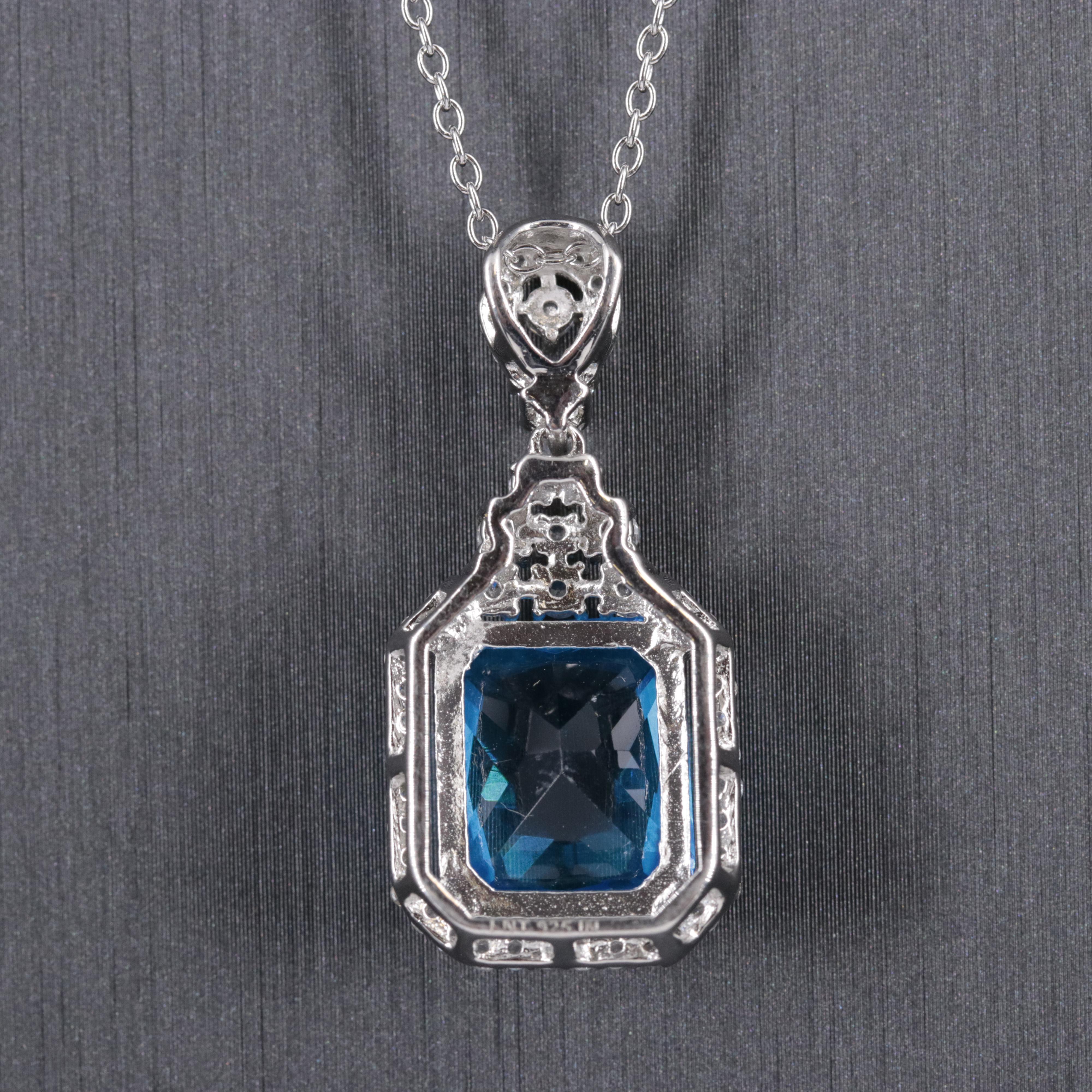 Sterling Pendant Necklace Featuring Topaz and Cubic Zirconia