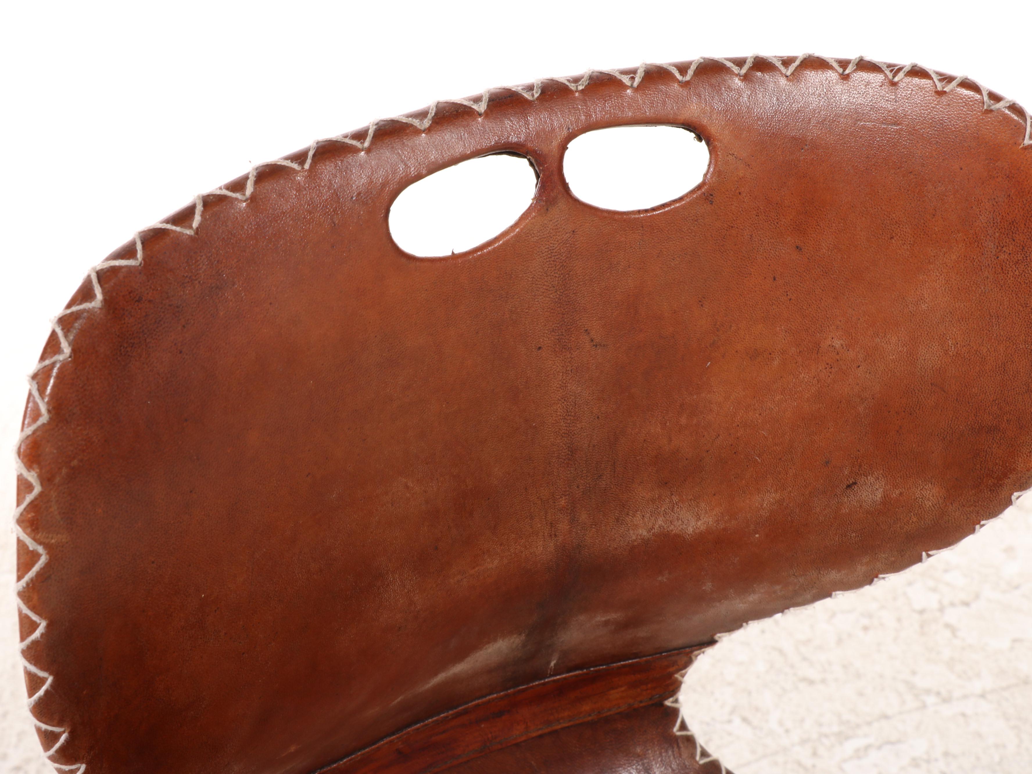 Three Modernist Tubular Metal, Molded Plastic and Leather Stacking Chairs