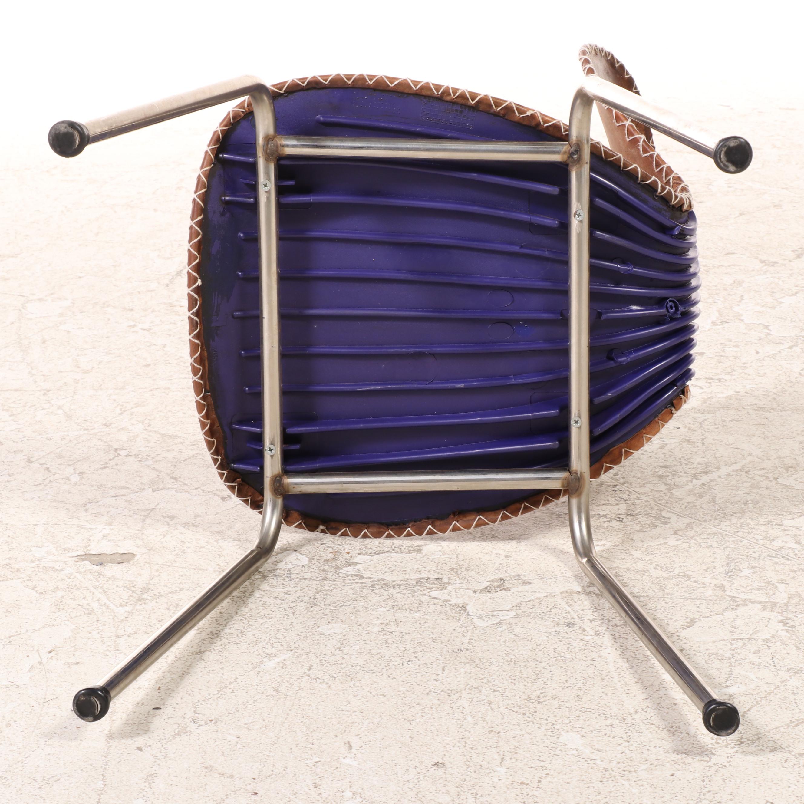 Three Modernist Tubular Metal, Molded Plastic and Leather Stacking Chairs