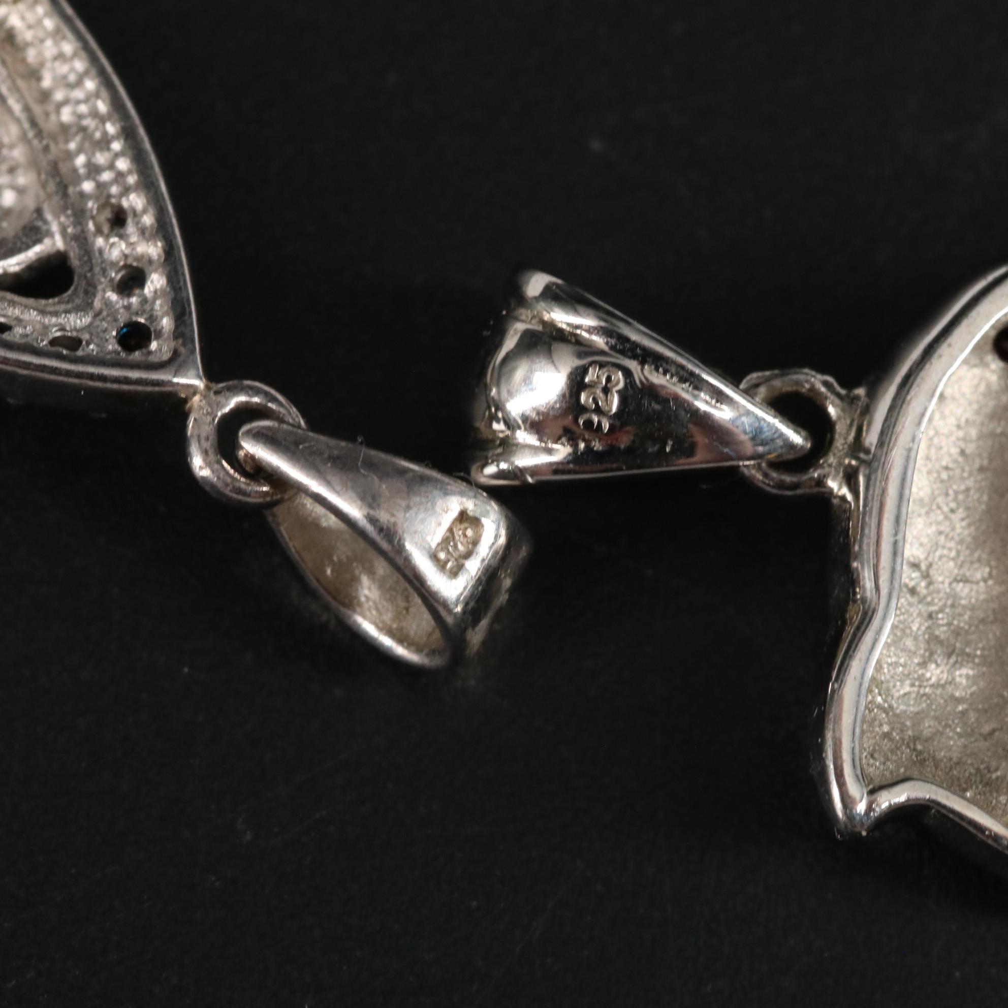 Sterling Pendant Duo Featuring Cubic Zirconia Amethyst Garnet and Abalone