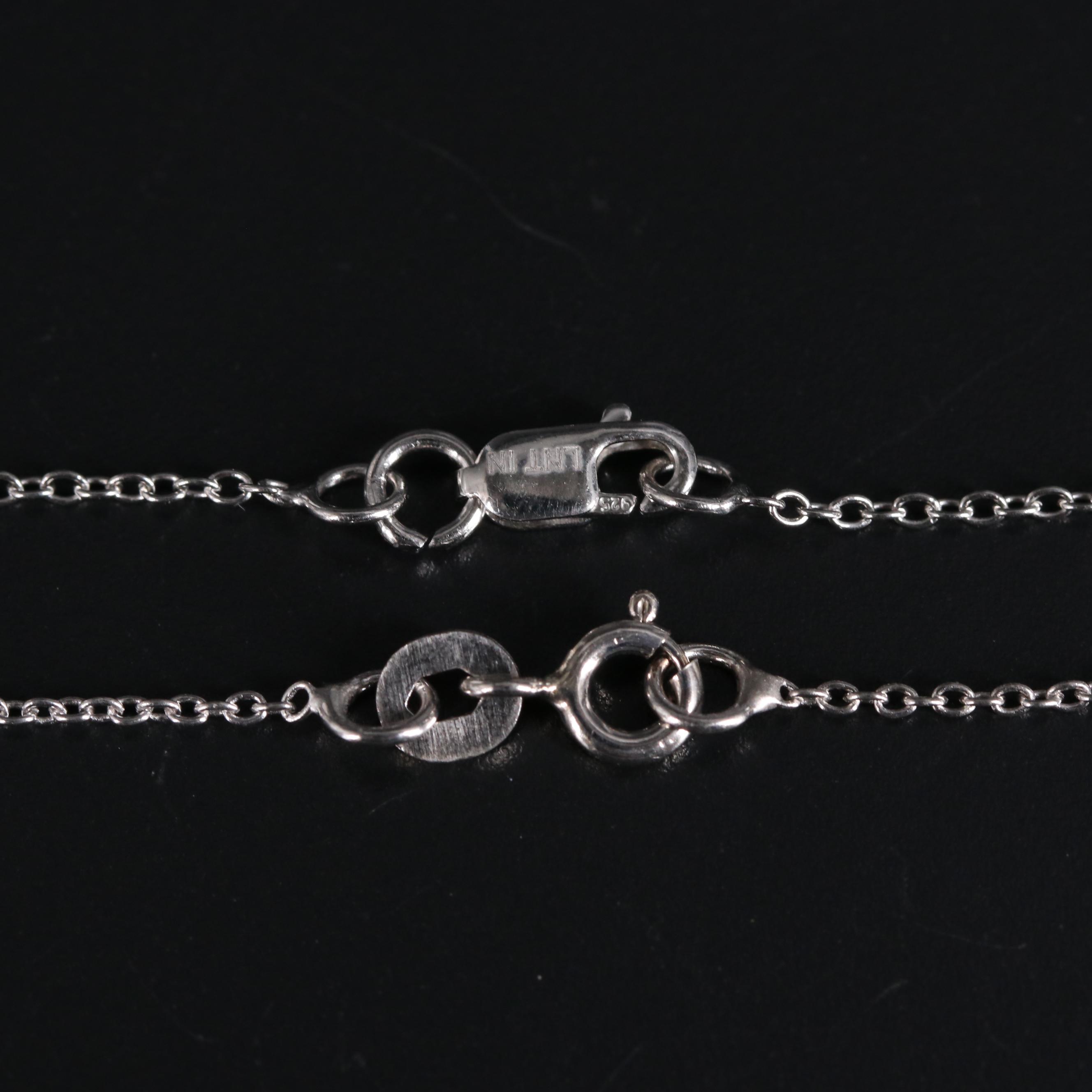 Sterling Silver Pendant Collection Including Sapphire and Cubic Zirconia