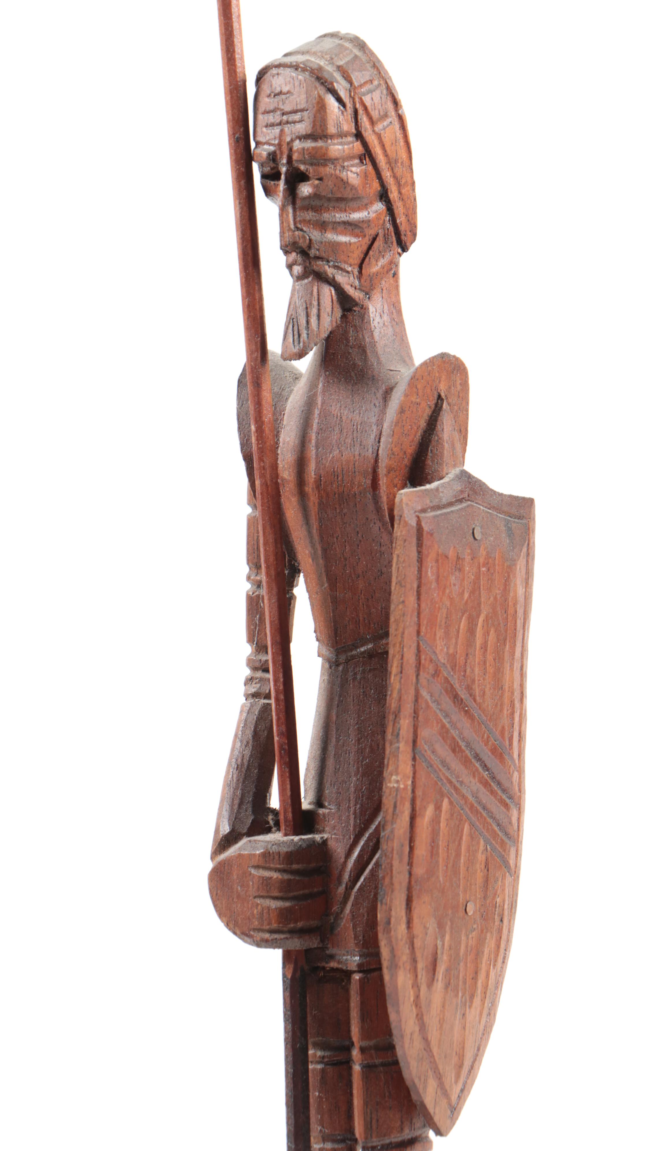 Hand-Carved Figurines Including a Monk, Don Quixote, and Folk Art Wood Carving