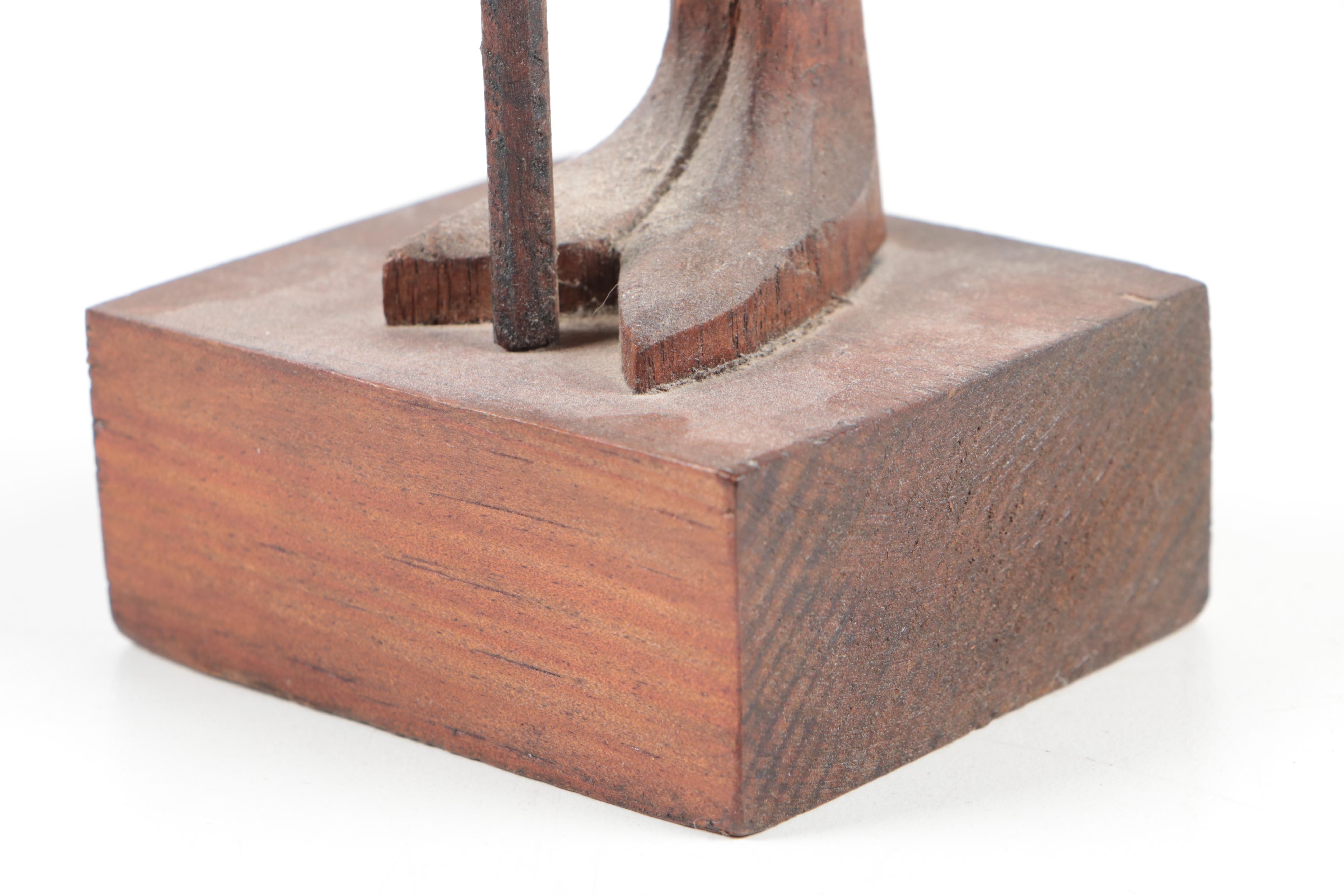 Hand-Carved Figurines Including a Monk, Don Quixote, and Folk Art Wood Carving