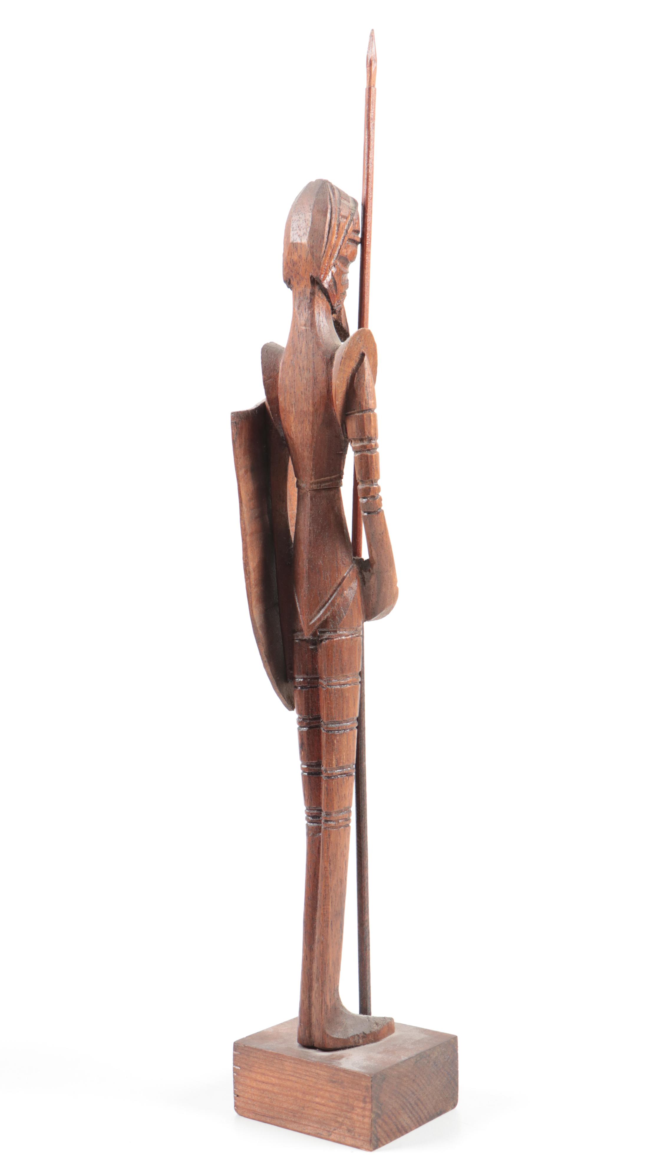 Hand-Carved Figurines Including a Monk, Don Quixote, and Folk Art Wood Carving