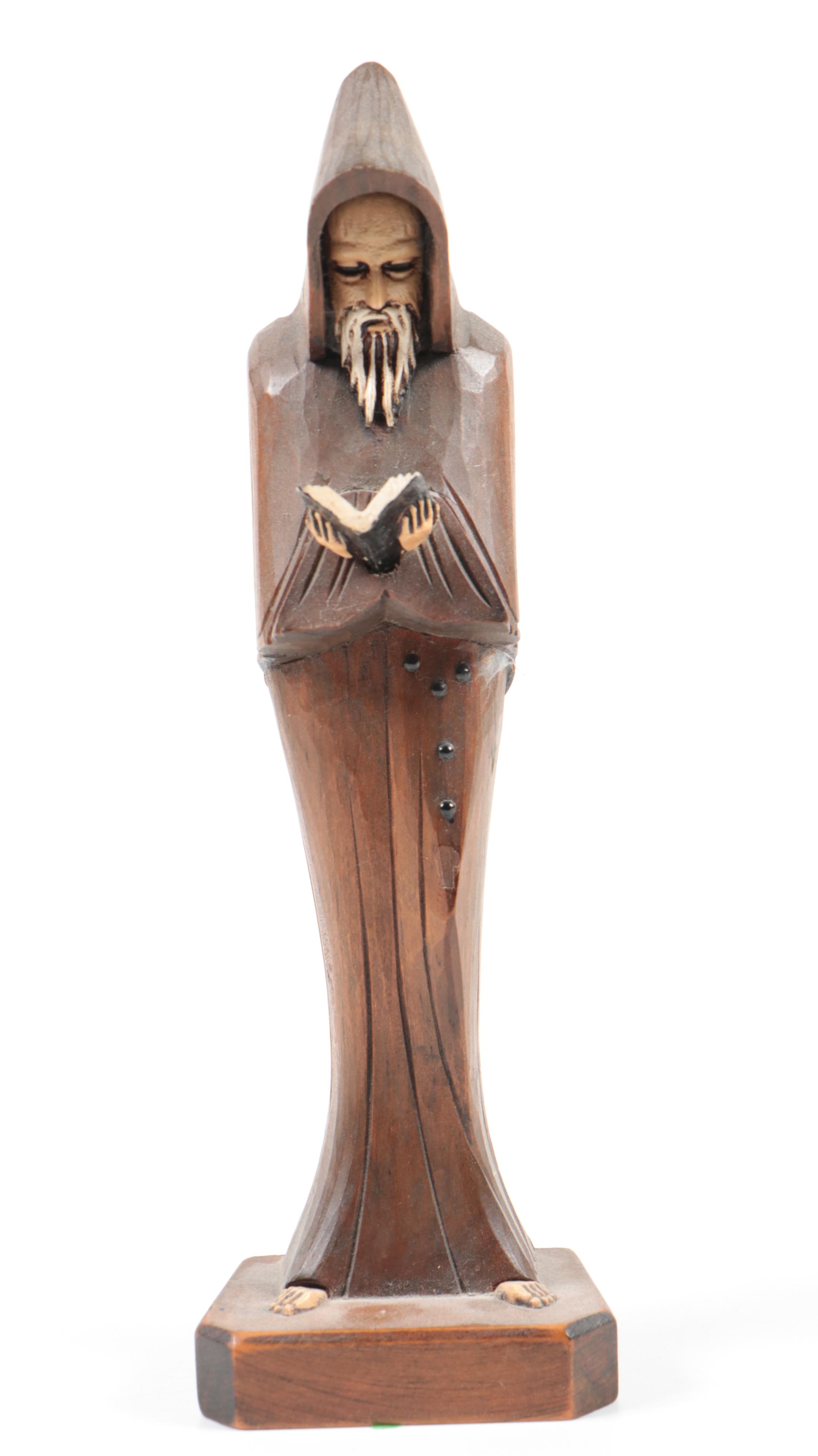 Hand-Carved Figurines Including a Monk, Don Quixote, and Folk Art Wood Carving