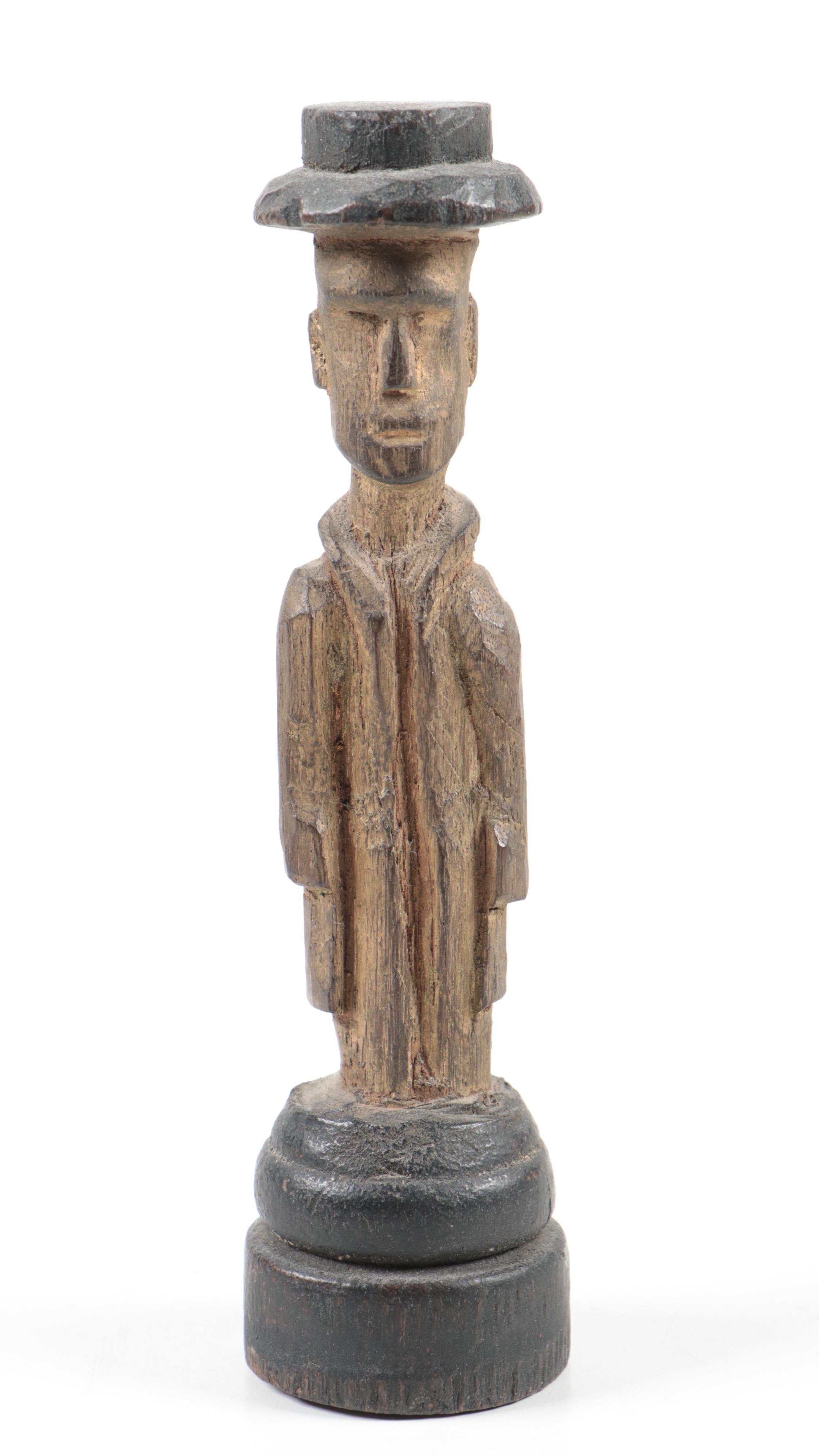 Hand-Carved Figurines Including a Monk, Don Quixote, and Folk Art Wood Carving