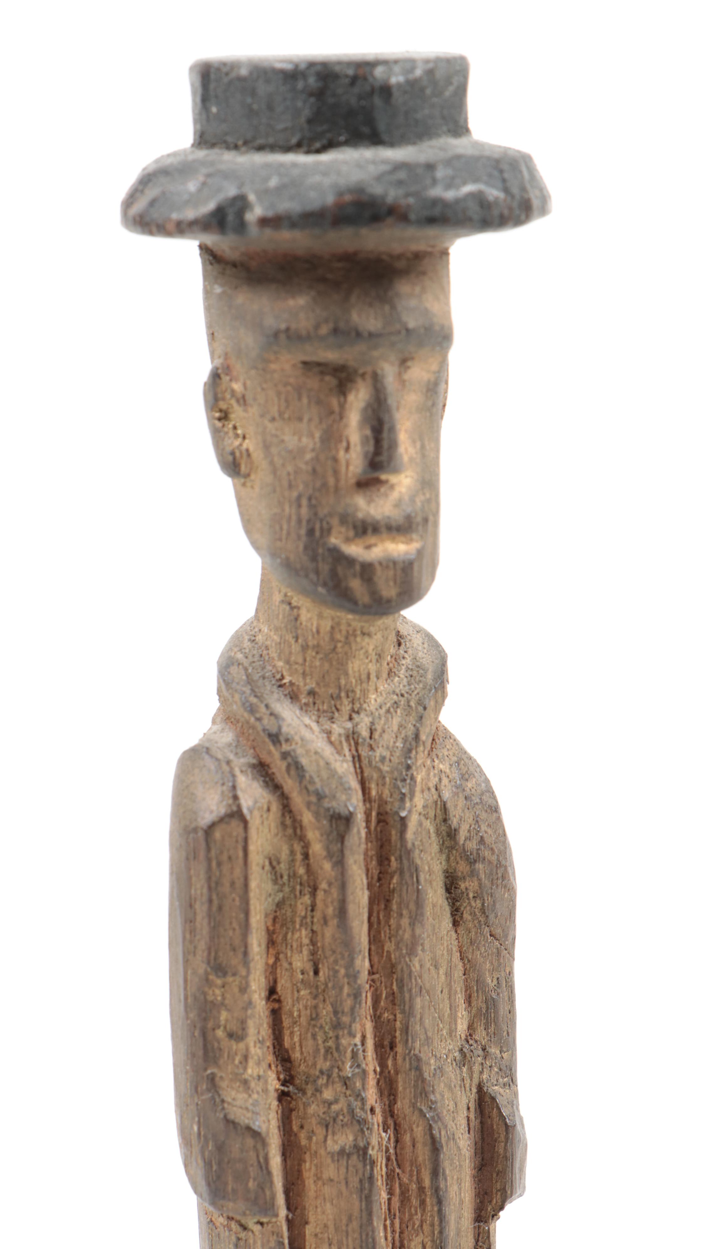 Hand-Carved Figurines Including a Monk, Don Quixote, and Folk Art Wood Carving