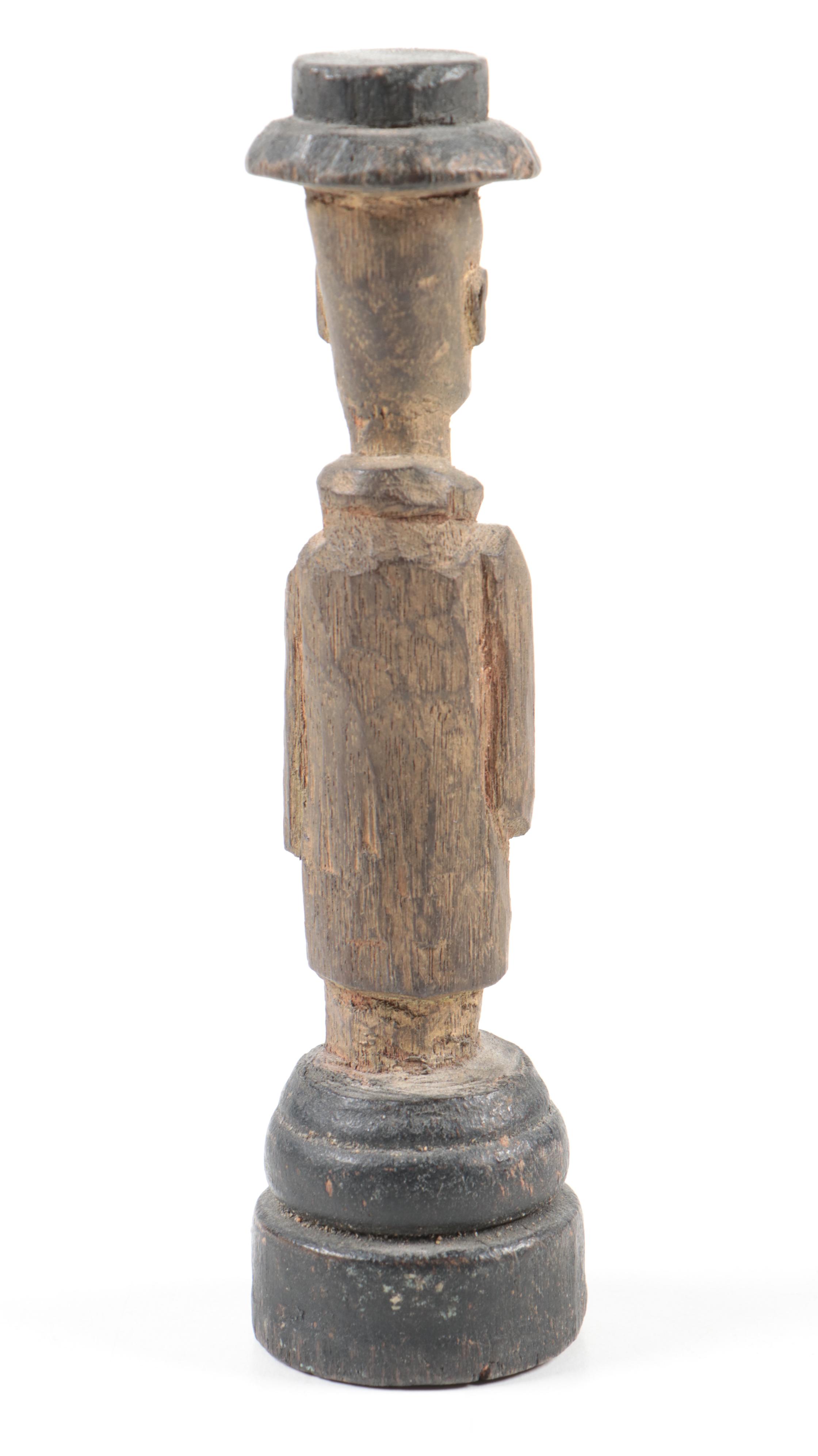 Hand-Carved Figurines Including a Monk, Don Quixote, and Folk Art Wood Carving