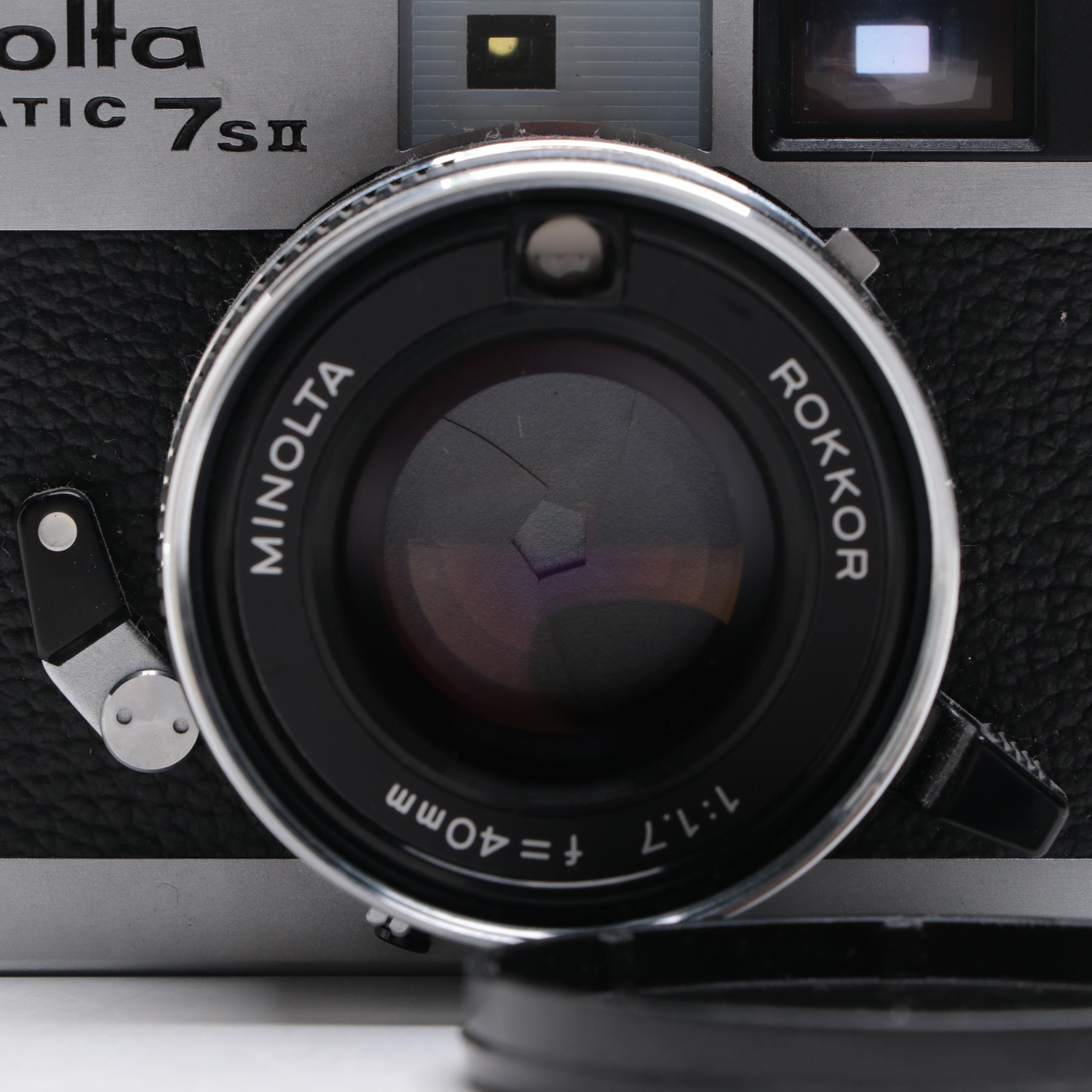 Olympus Pen-F and Minolta Hi-Matic 7SII 35 mm Cameras