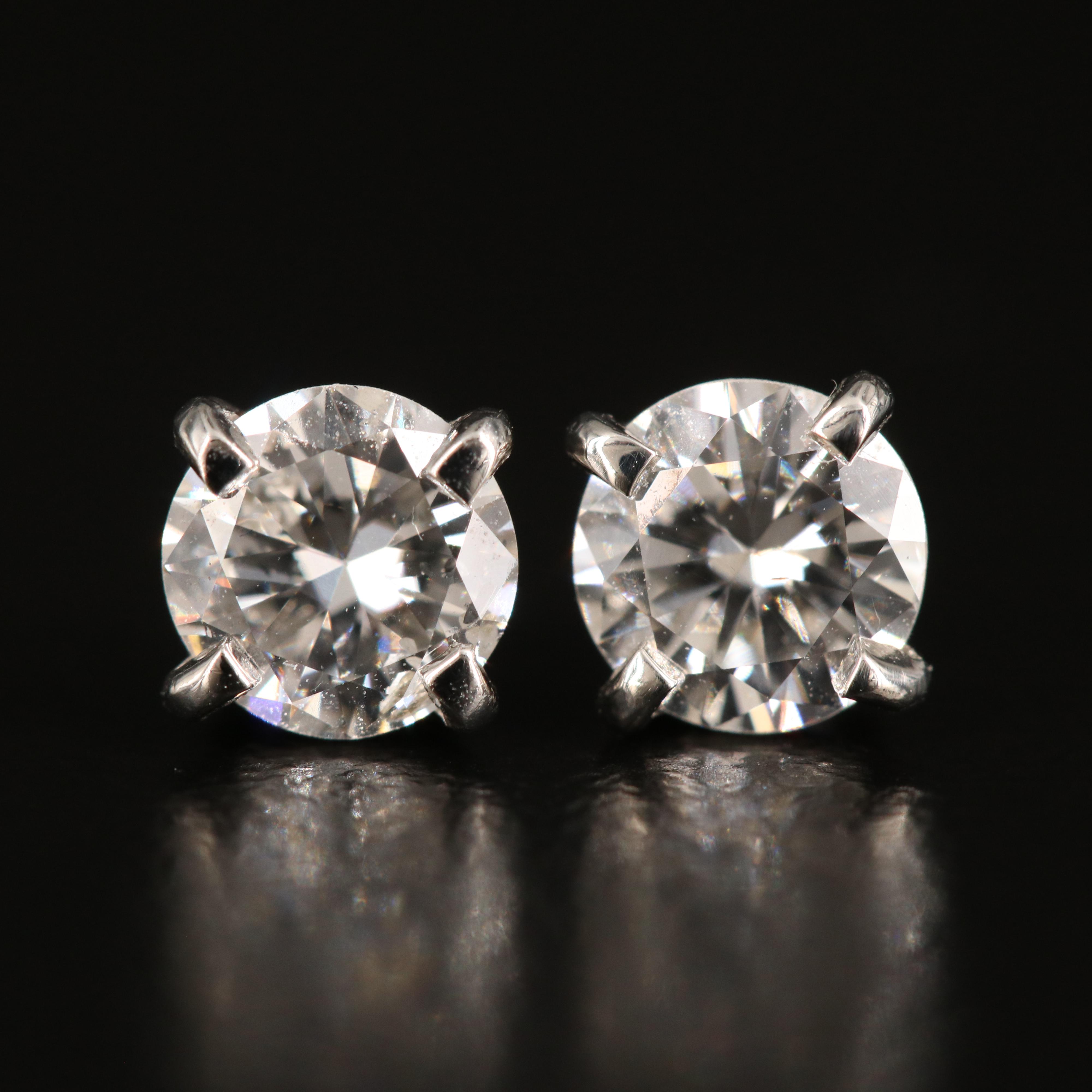 Platinum 0.95 CTW Diamond Stud Earrings with GIA eReport