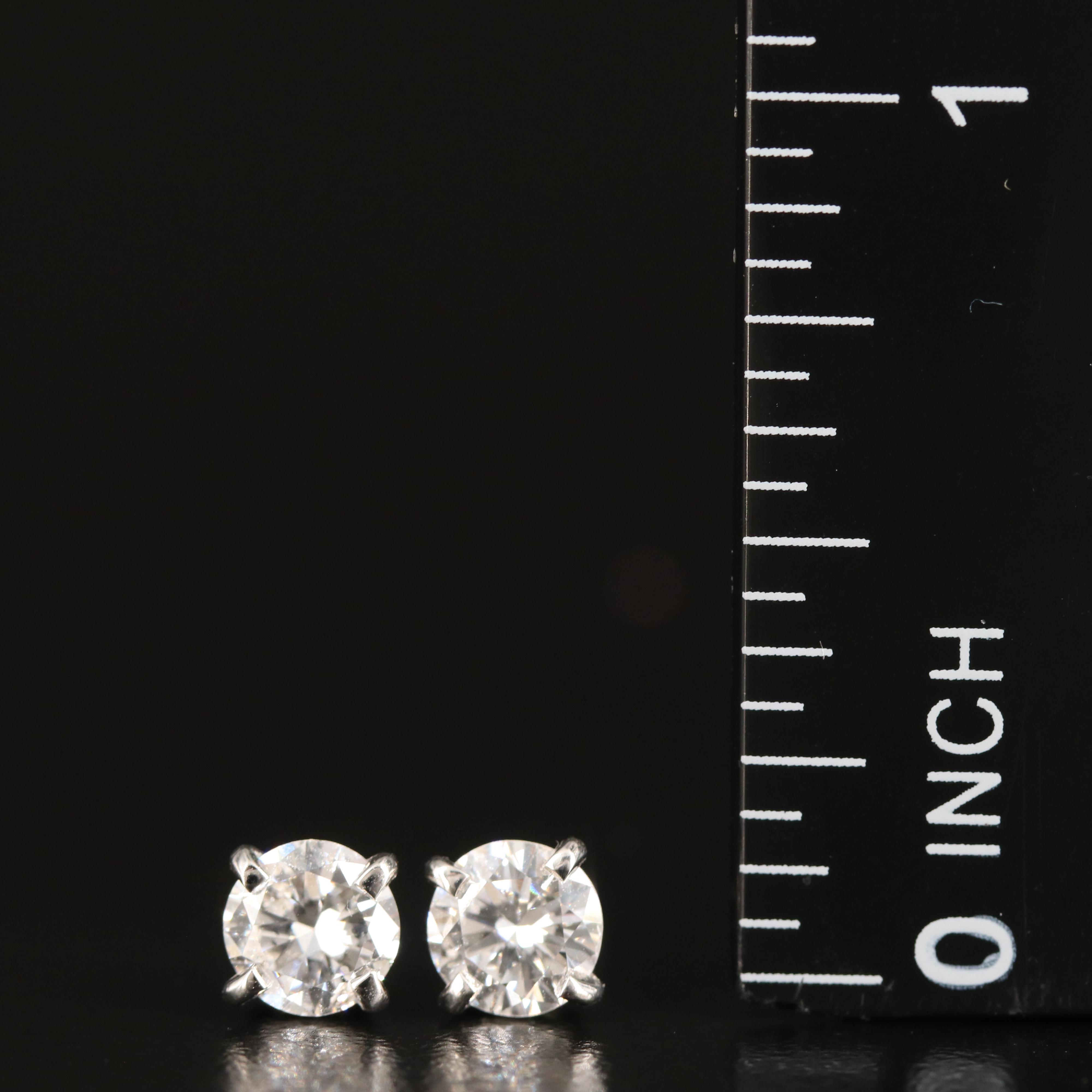 Platinum 0.95 CTW Diamond Stud Earrings with GIA eReport