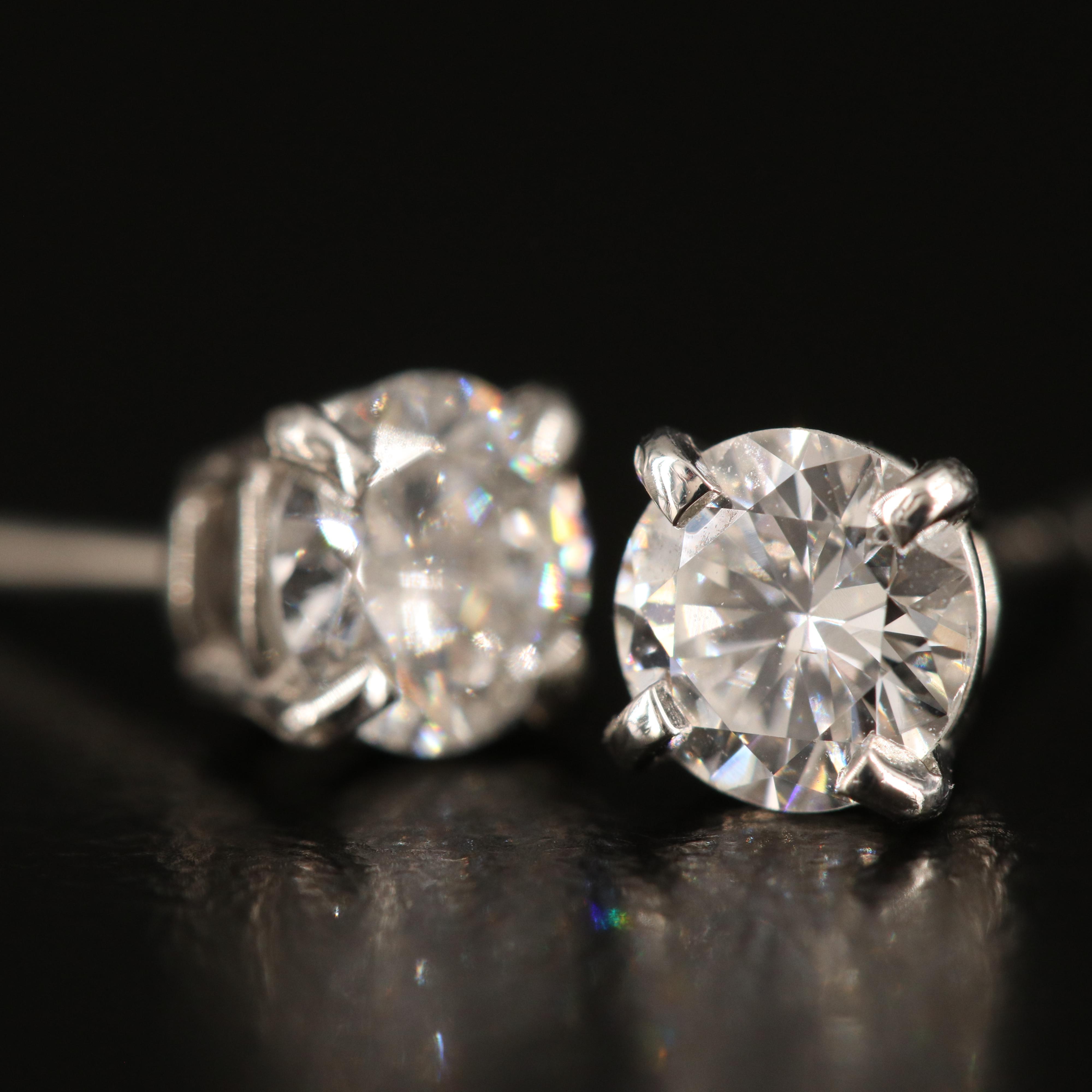 Platinum 0.95 CTW Diamond Stud Earrings with GIA eReport