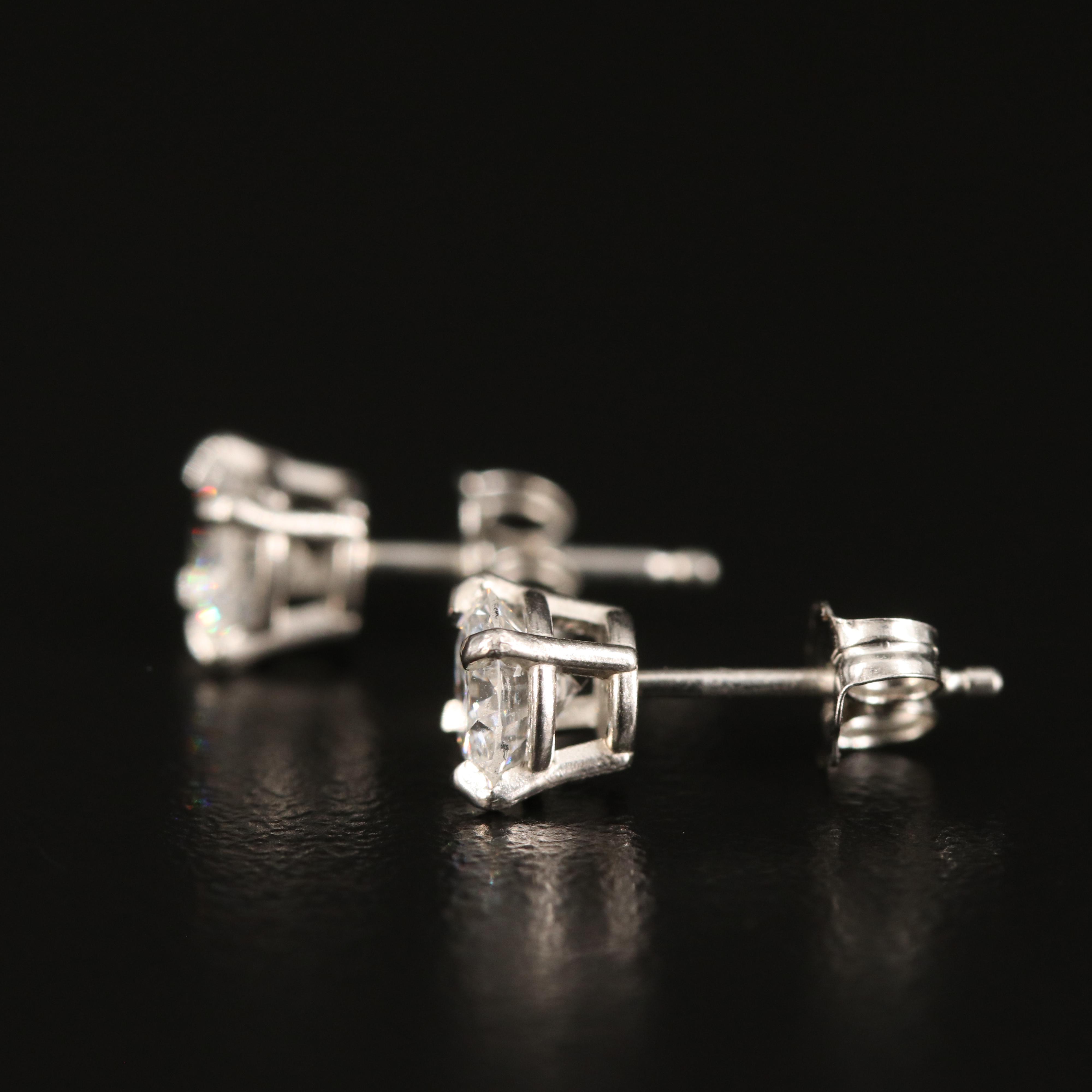 Platinum 0.95 CTW Diamond Stud Earrings with GIA eReport