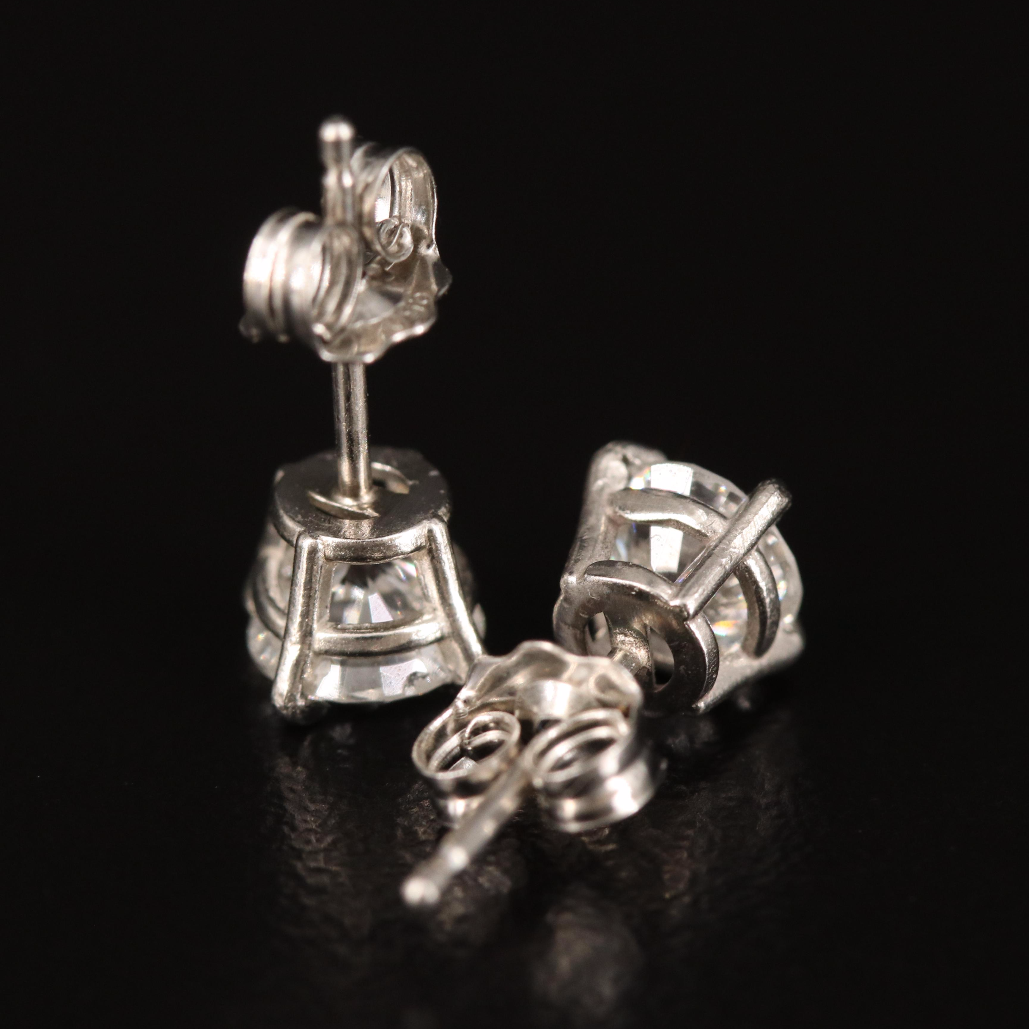 Platinum 0.95 CTW Diamond Stud Earrings with GIA eReport