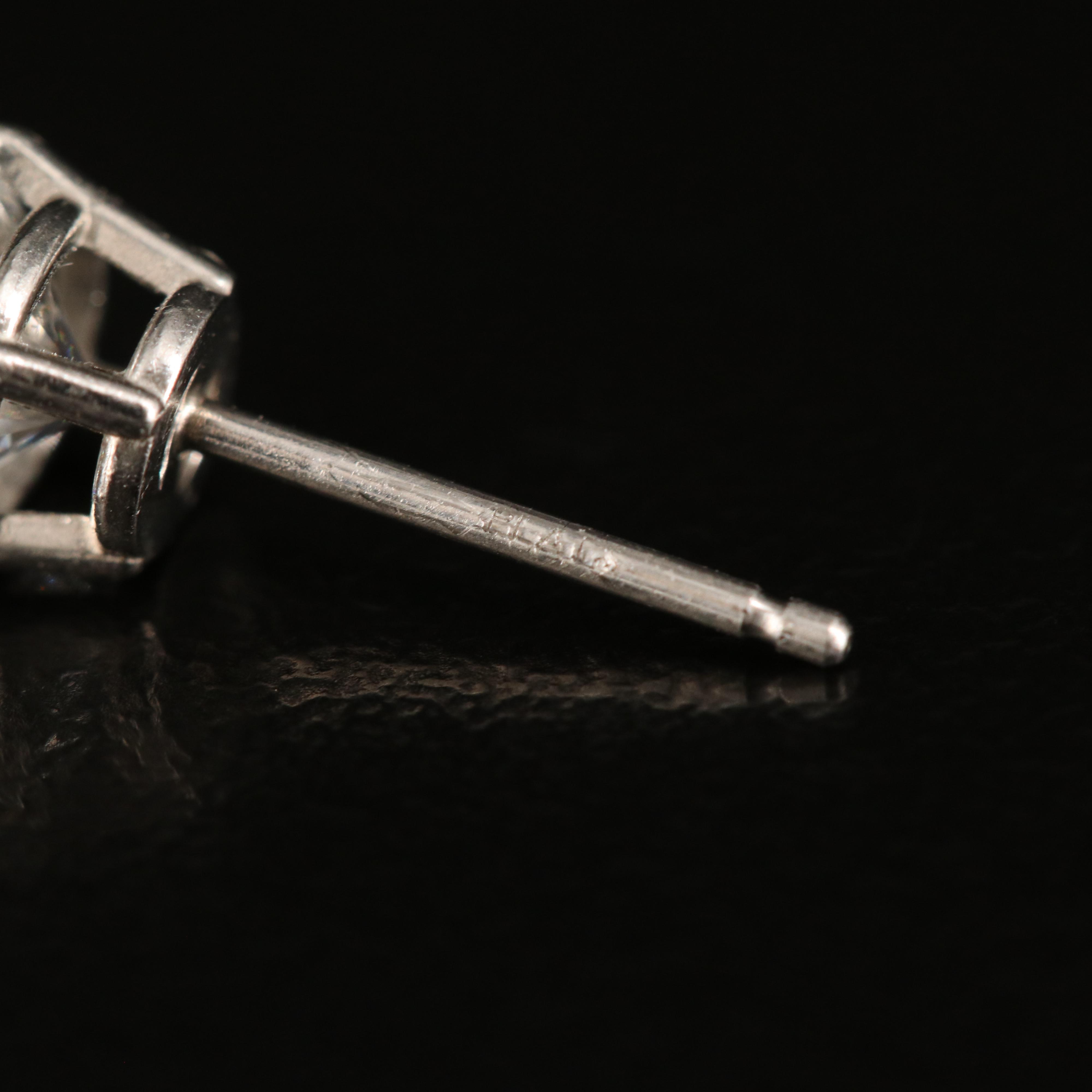 Platinum 0.95 CTW Diamond Stud Earrings with GIA eReport