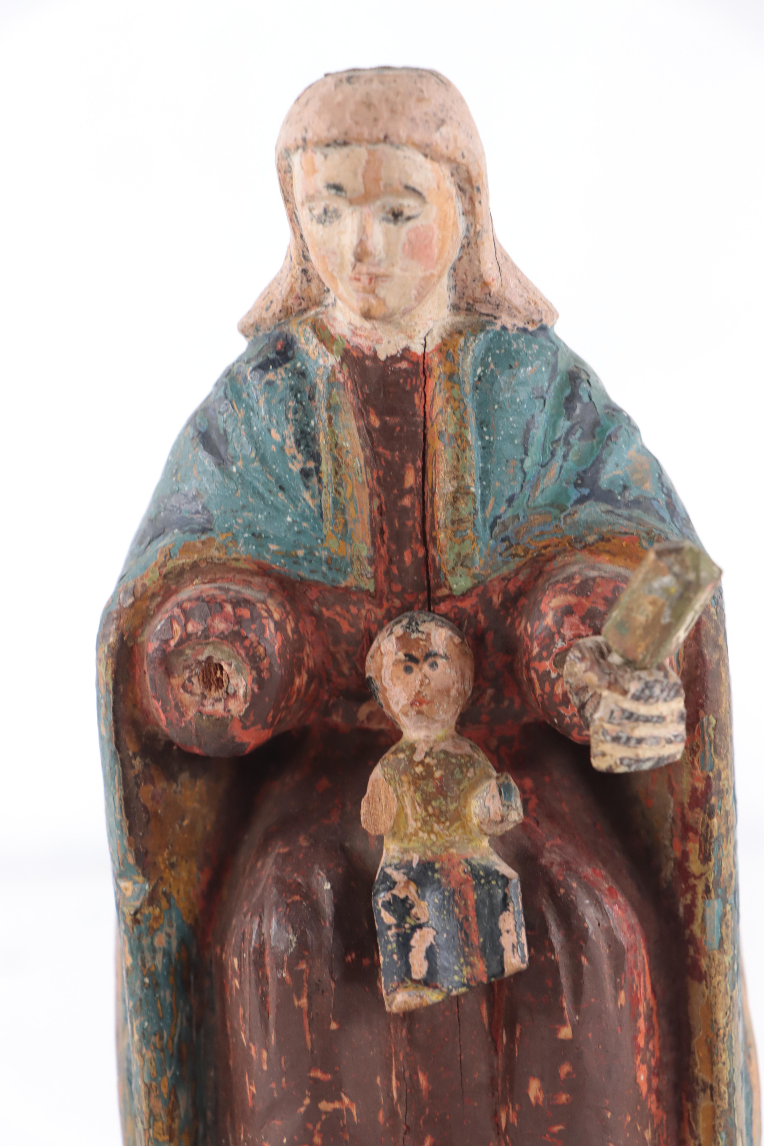 Spanish Colonial Polychrome Madonna Santos and Other Wooden Carved Madonna