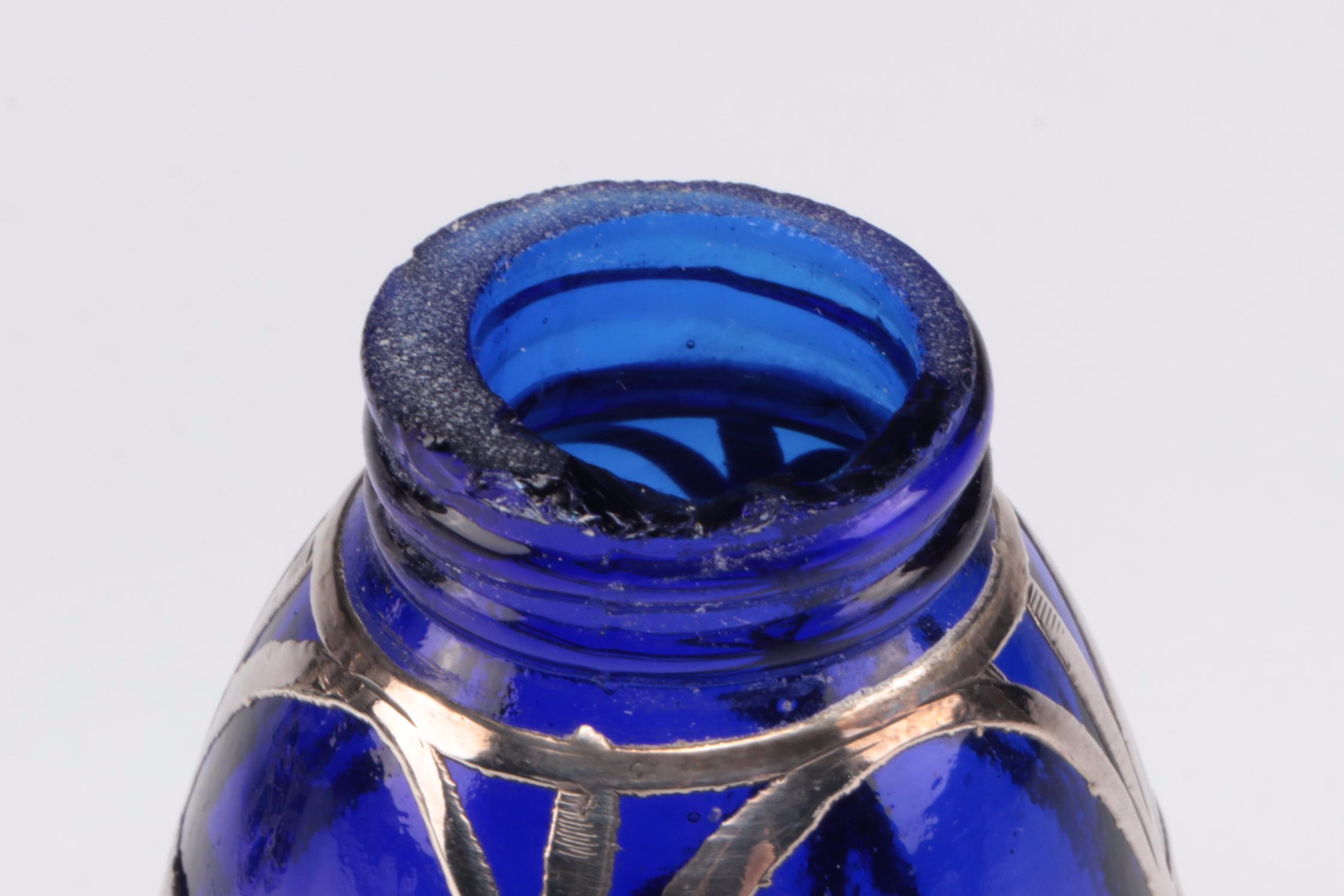 Sterling Silver Overlay and Emerald Glass Vanity Bottles with Other Shaker