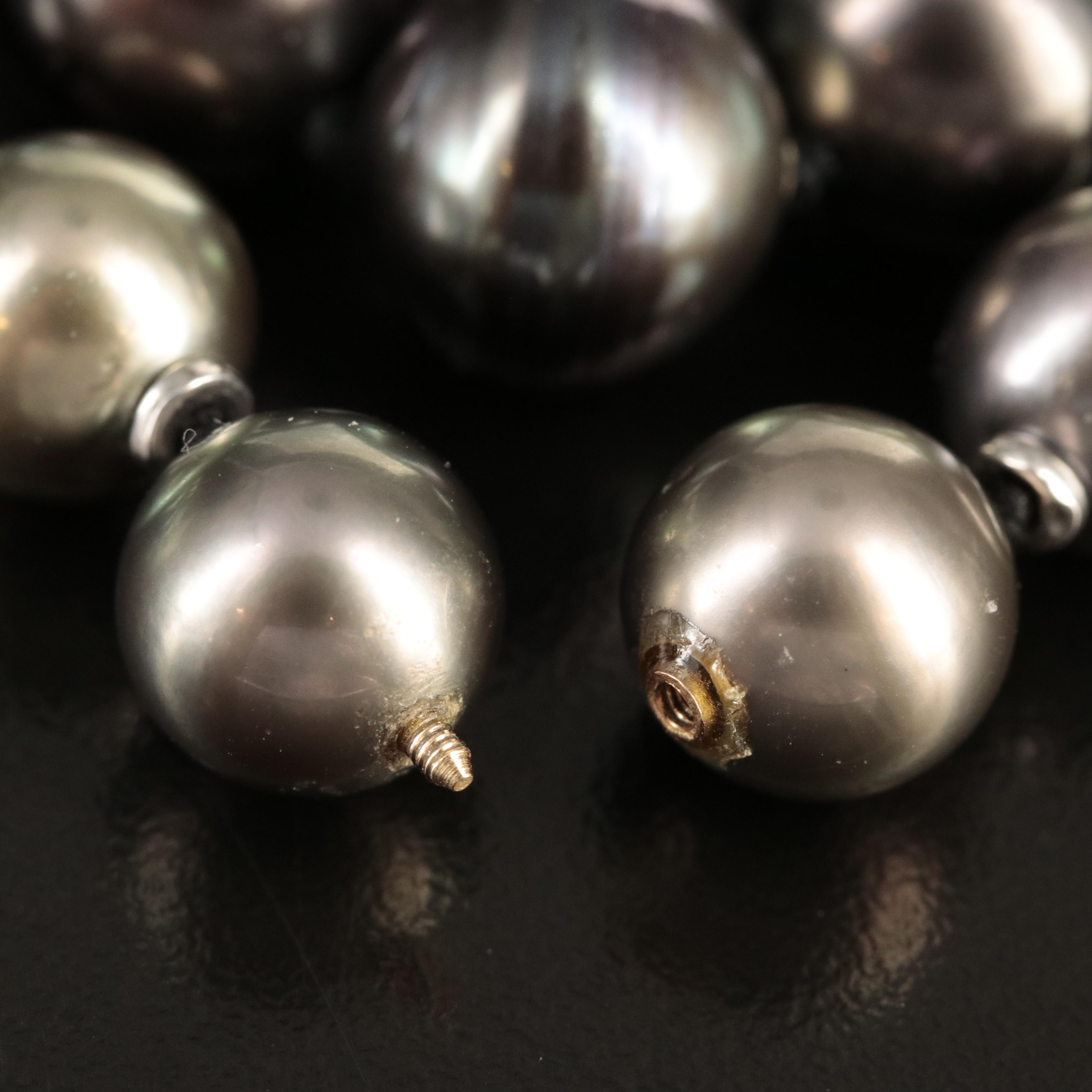 Graduated 10.00 - 14.00 mm Pearl and 4.52 CTW Diamond Station Necklace