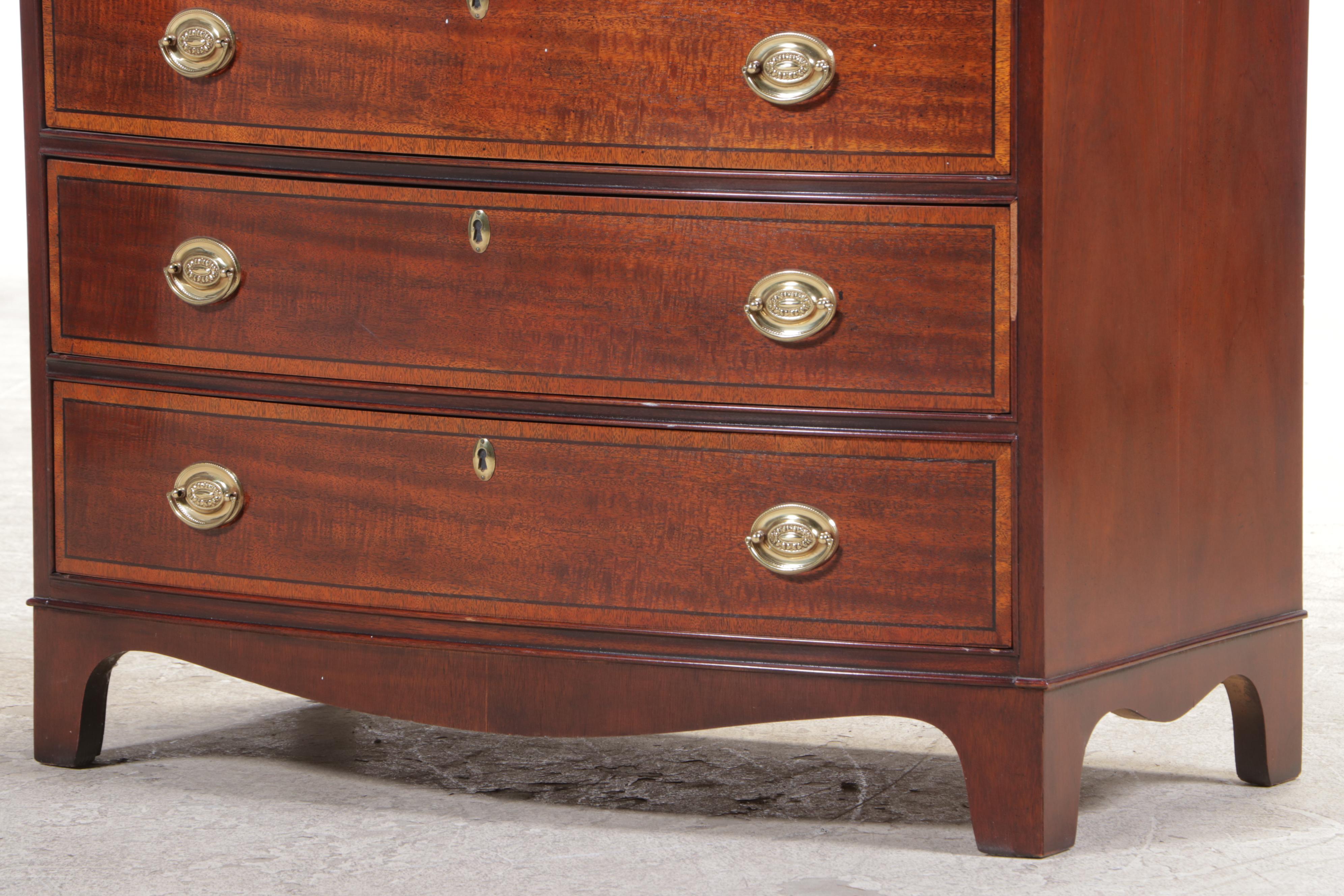Baker George III Style Mahogany and Crossbanded Four-Drawer Bowfront Chest