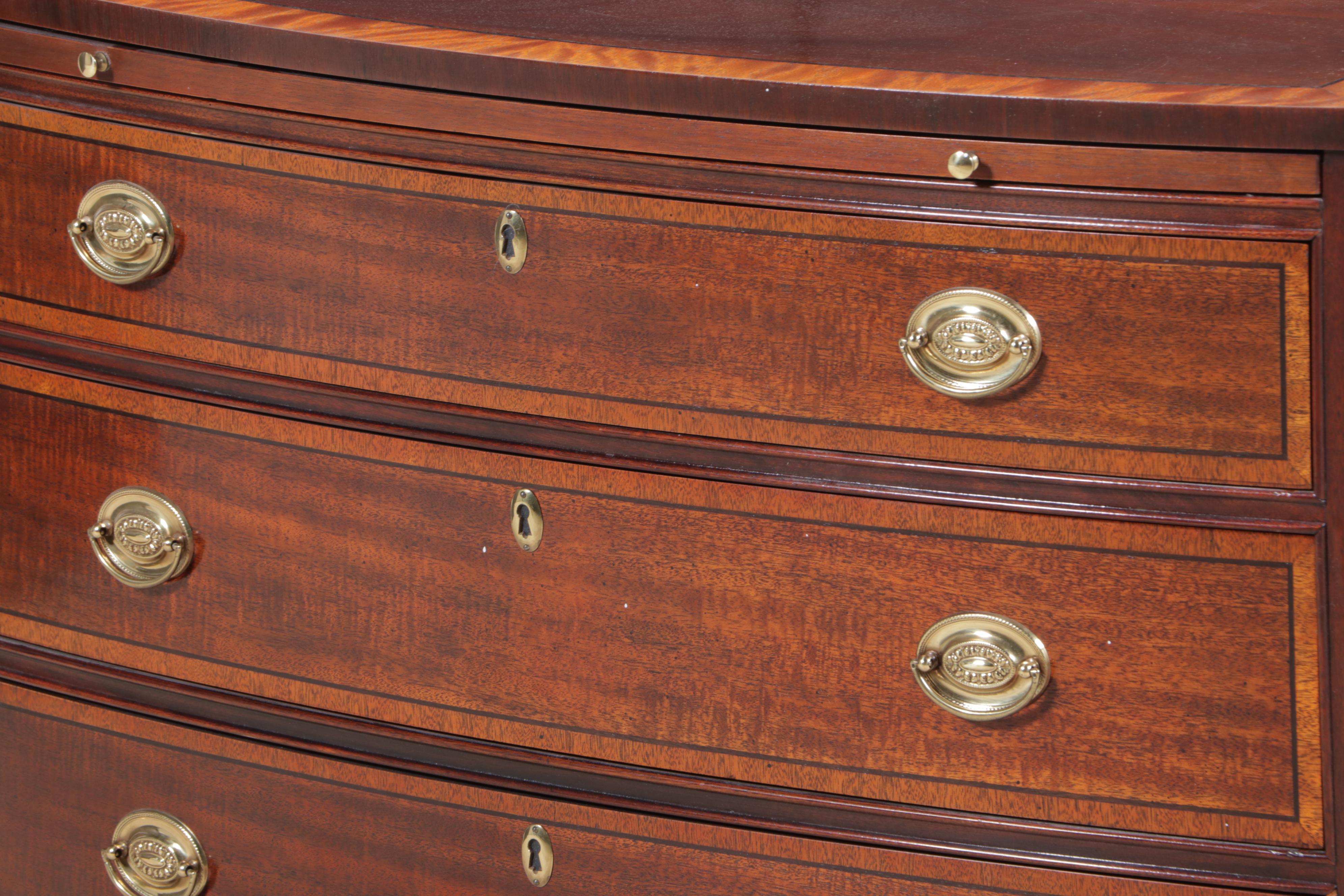 Baker George III Style Mahogany and Crossbanded Four-Drawer Bowfront Chest