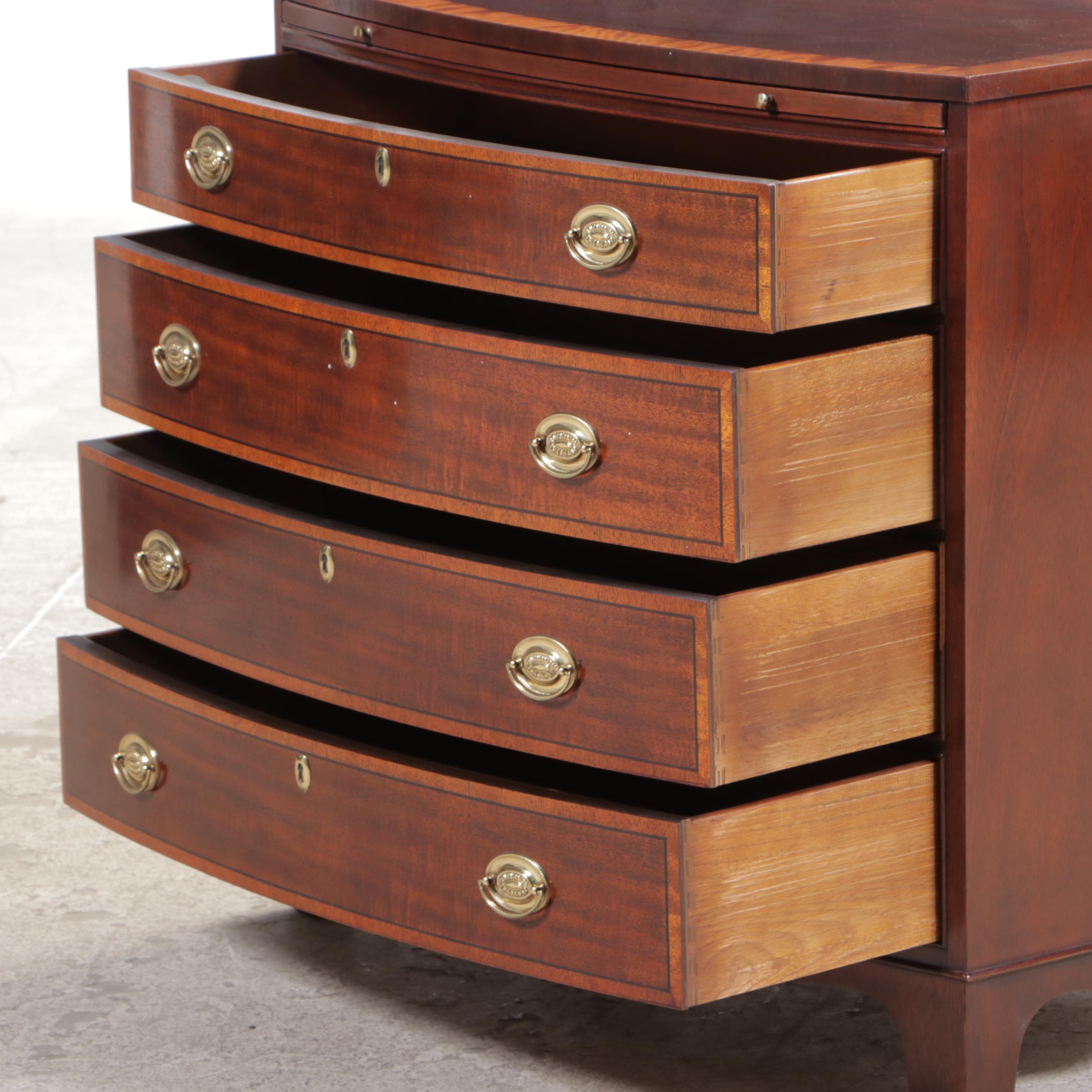 Baker George III Style Mahogany and Crossbanded Four-Drawer Bowfront Chest