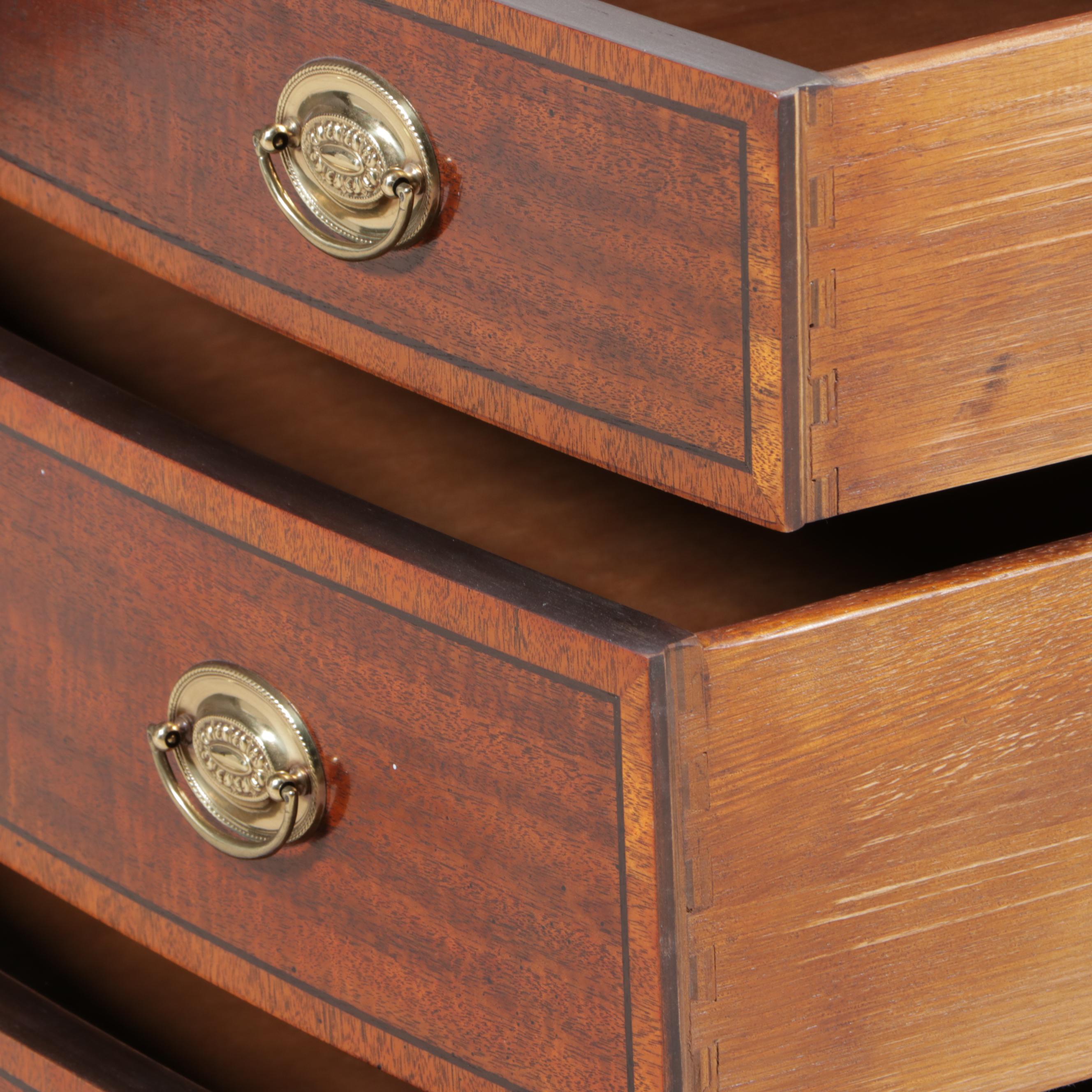 Baker George III Style Mahogany and Crossbanded Four-Drawer Bowfront Chest