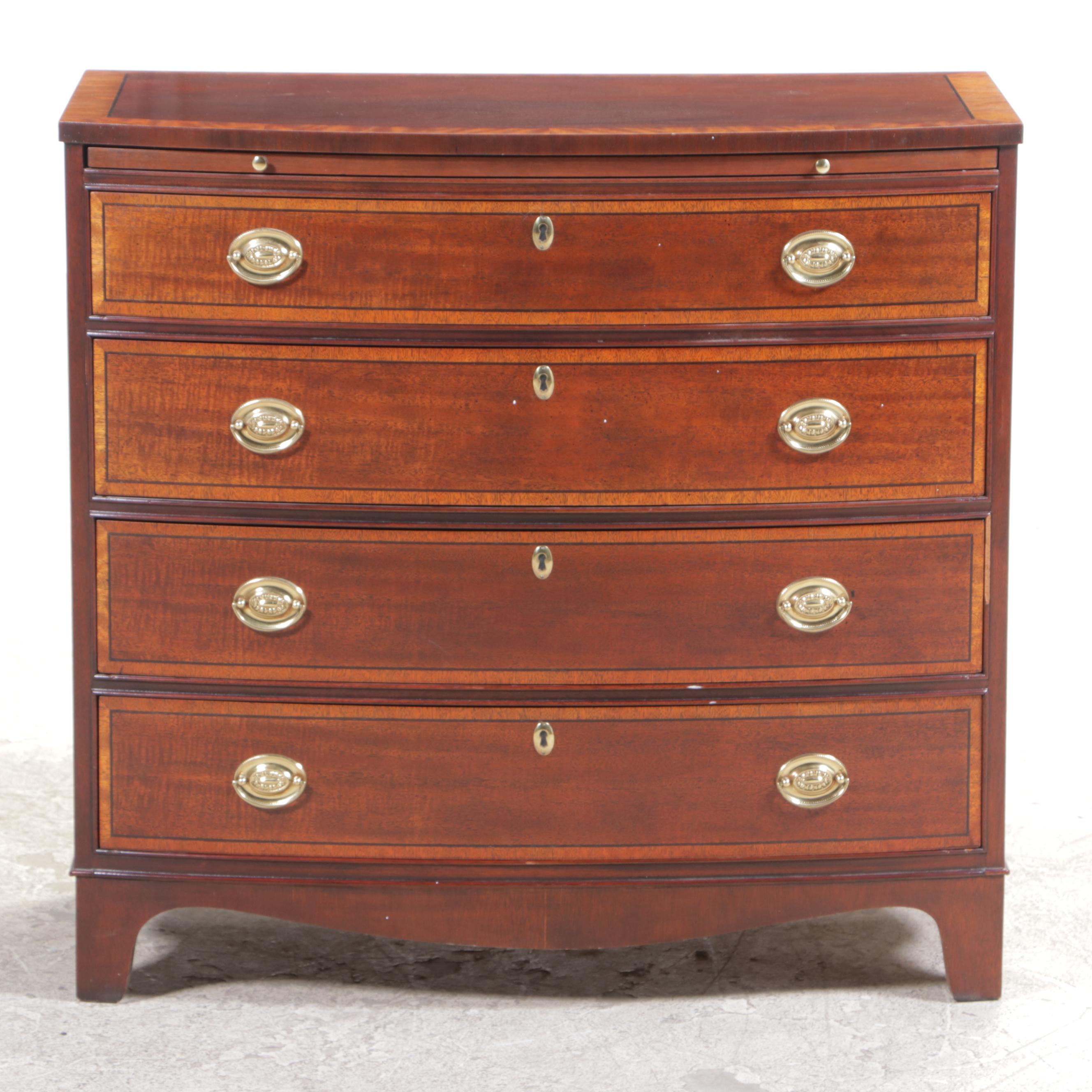 Baker George III Style Mahogany and Crossbanded Four-Drawer Bowfront Chest