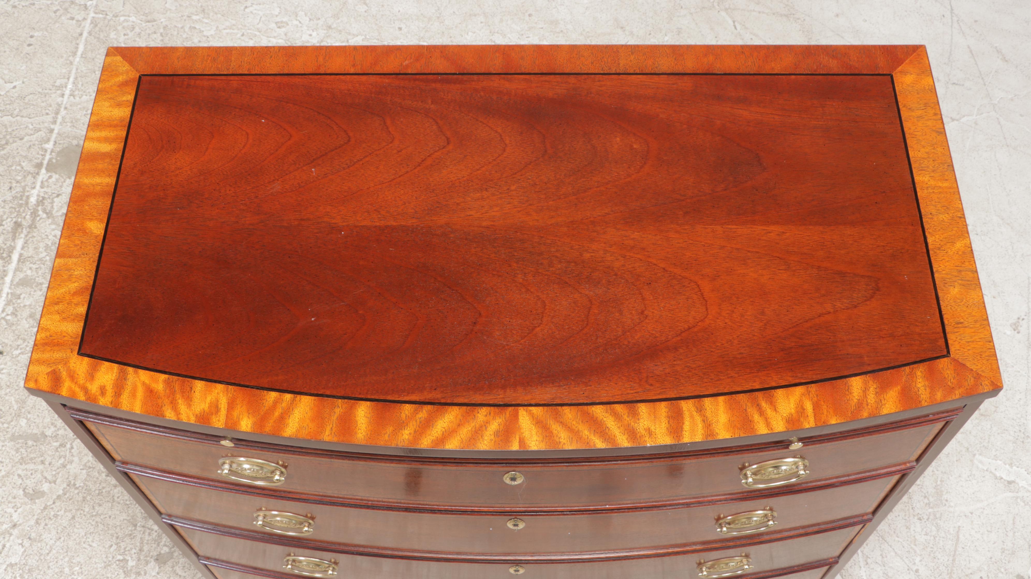 Baker George III Style Mahogany and Crossbanded Four-Drawer Bowfront Chest