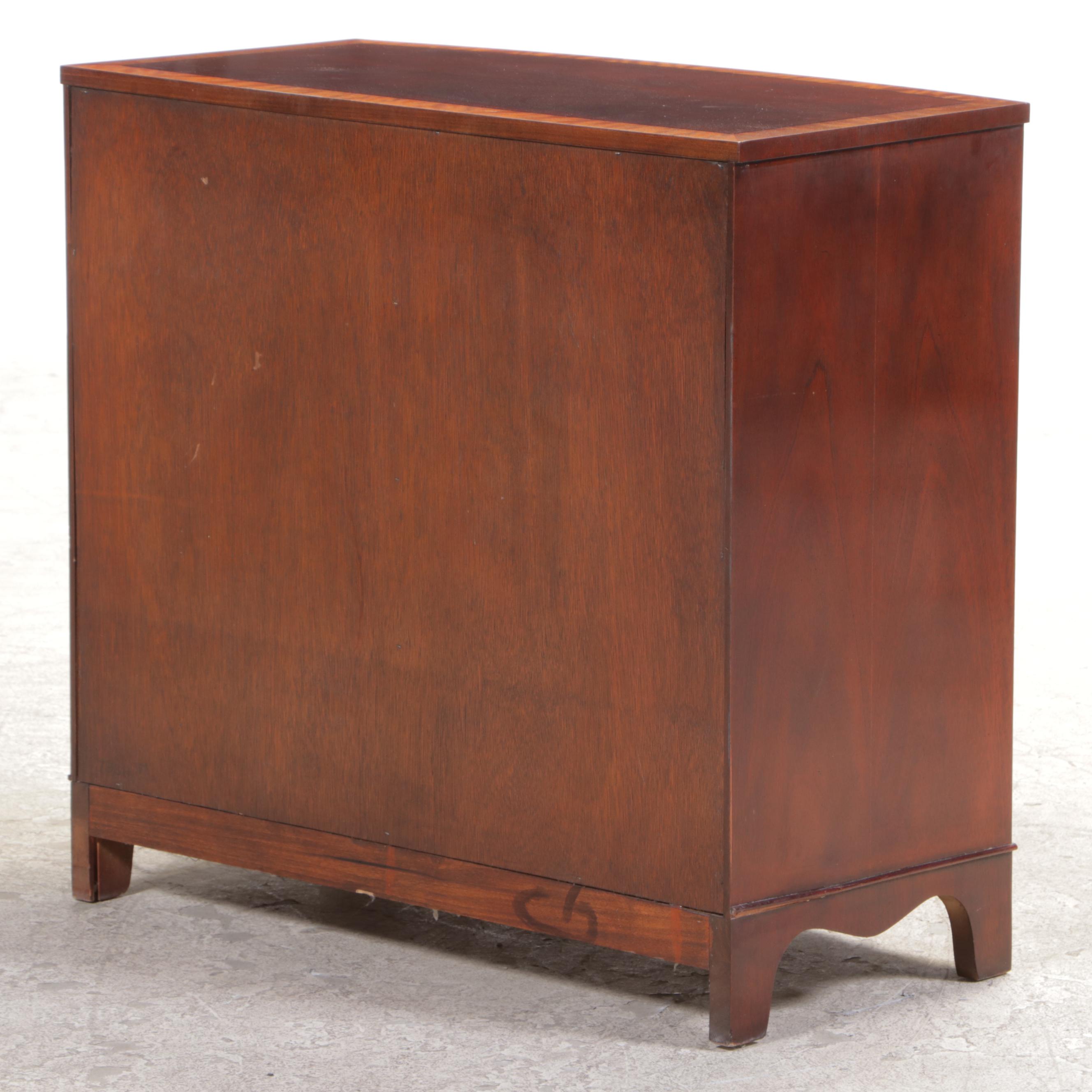 Baker George III Style Mahogany and Crossbanded Four-Drawer Bowfront Chest