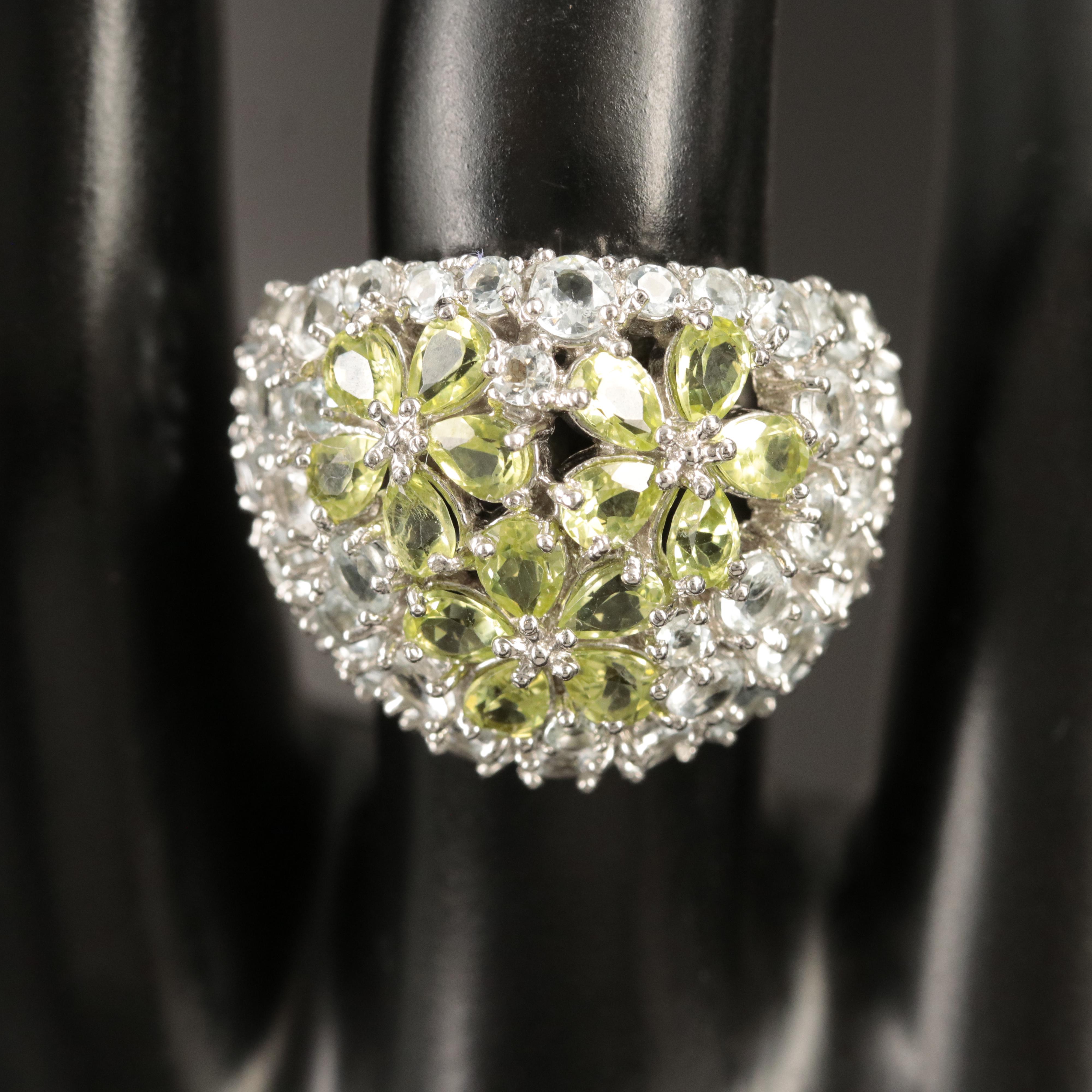 Sterling Peridot and Goshenite Floral Dome Ring