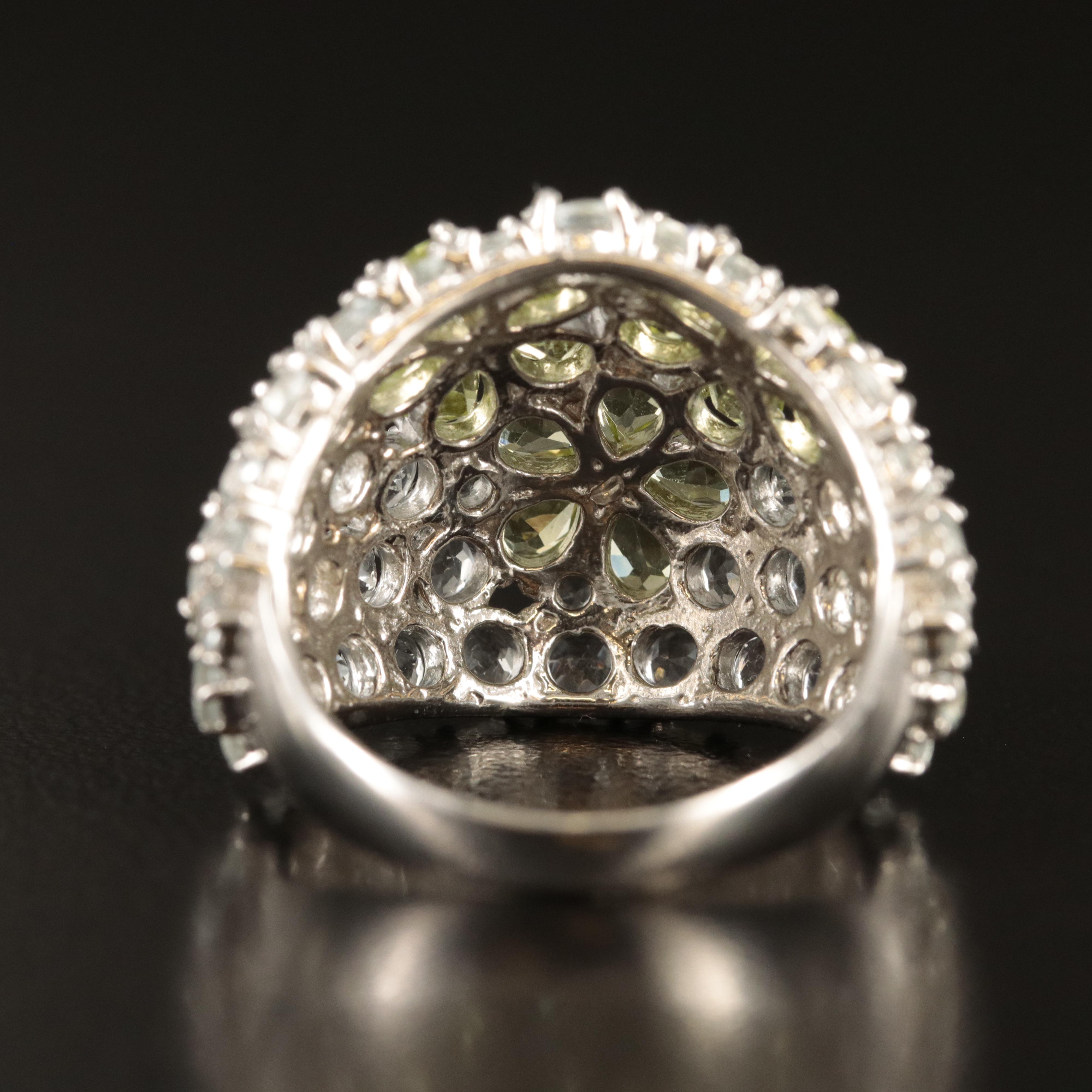 Sterling Peridot and Goshenite Floral Dome Ring