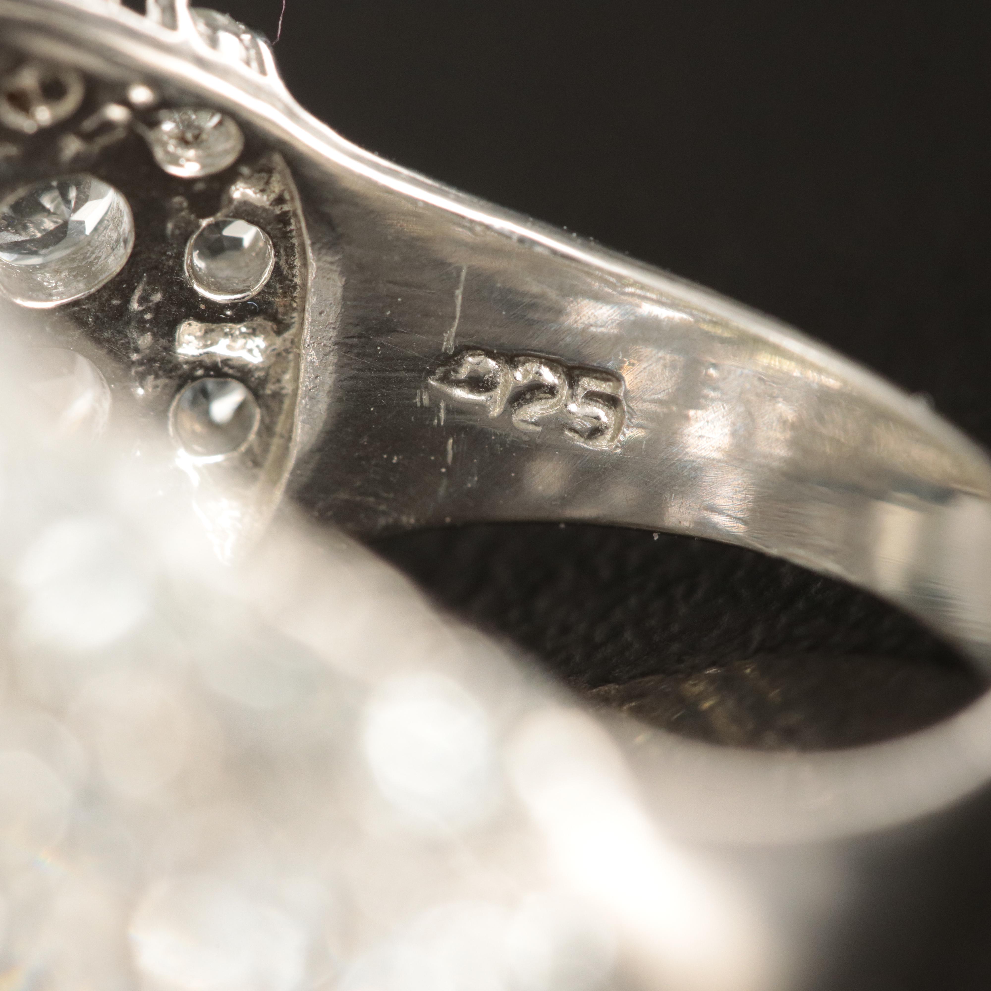 Sterling Peridot and Goshenite Floral Dome Ring