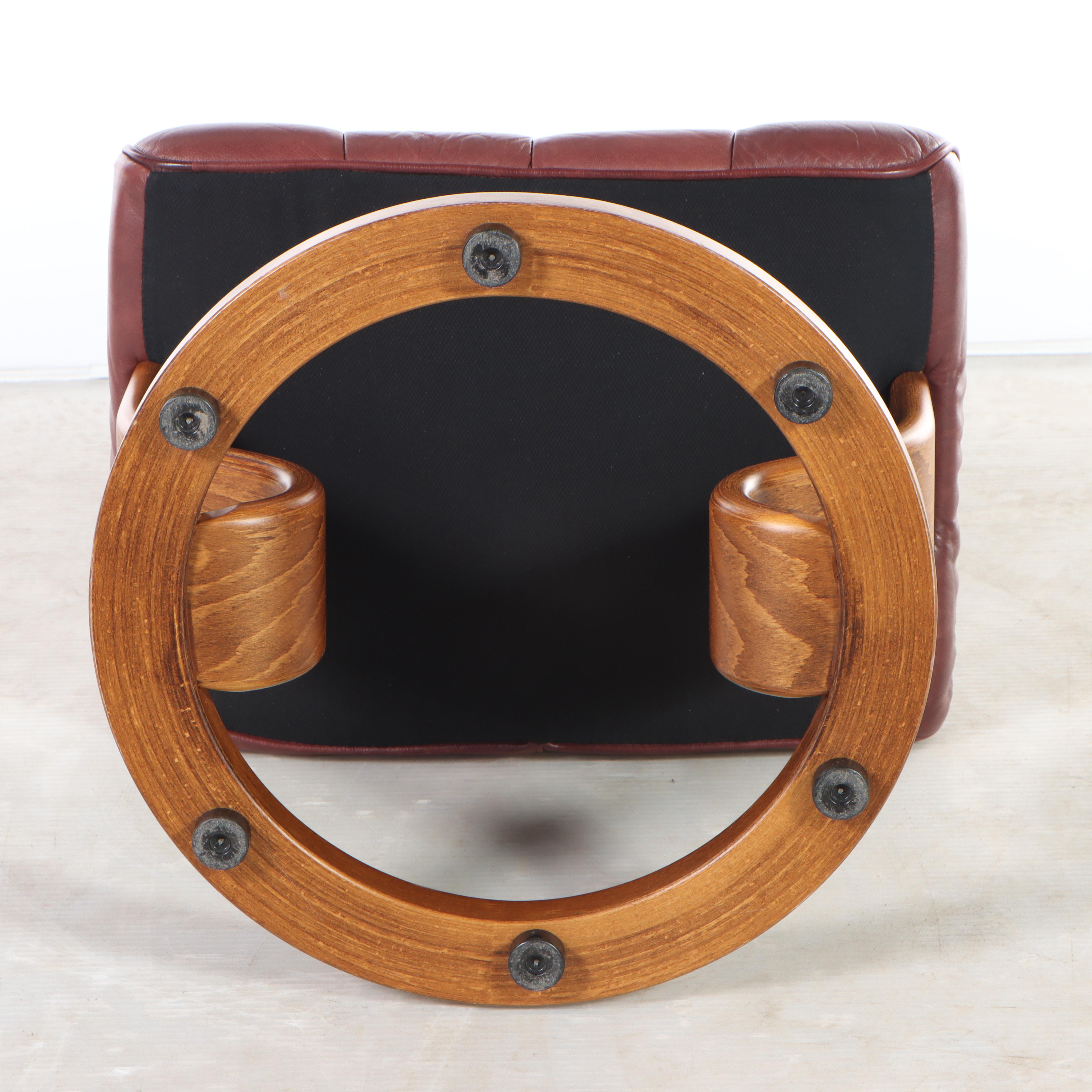 Ekornes "Stressless" Leather Upholstered Bentwood Recliner and Ottoman