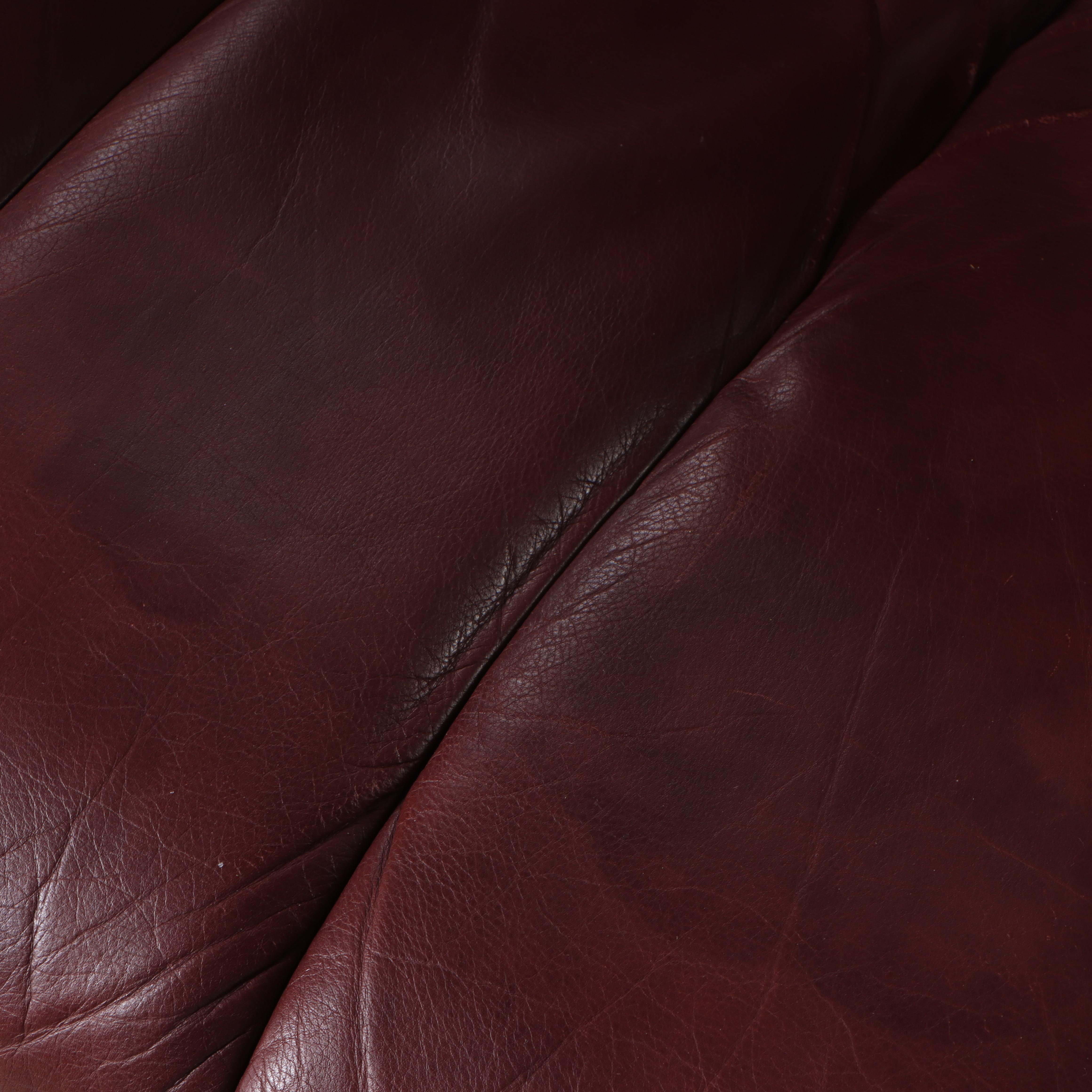 Ekornes "Stressless" Leather Upholstered Bentwood Recliner and Ottoman