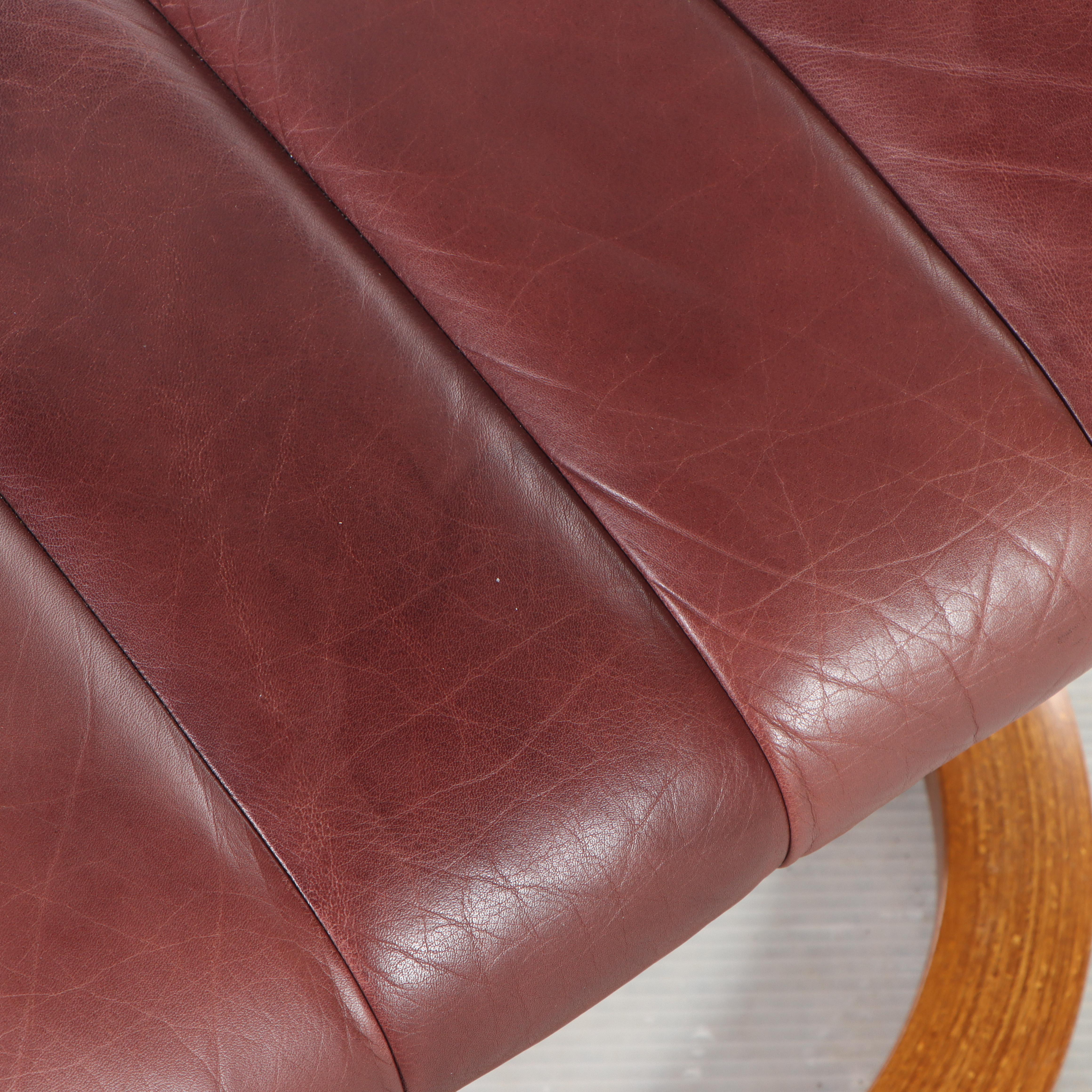 Ekornes "Stressless" Leather Upholstered Bentwood Recliner and Ottoman