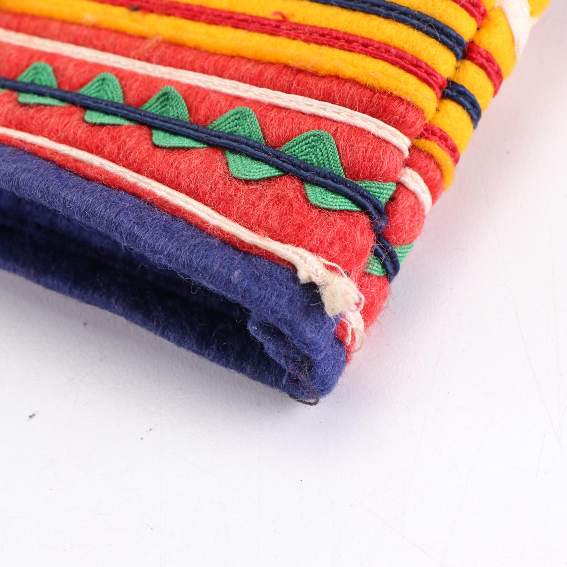 Sámi Style Felt Hat Embellished with Ribbons and Enamel Souvenir Pins
