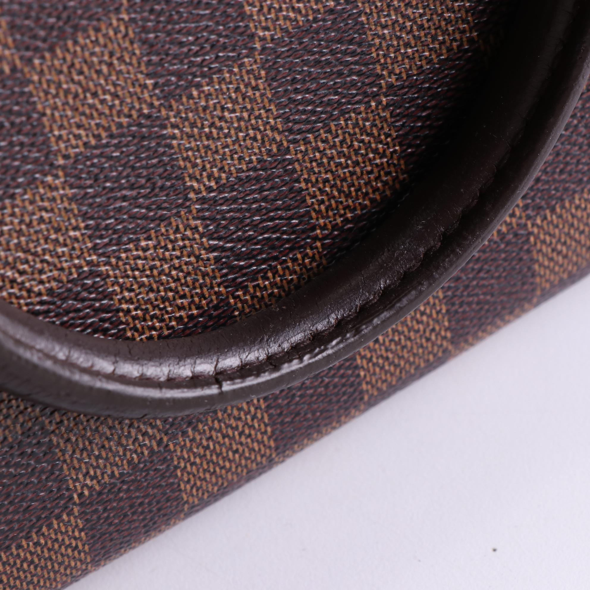 Louis Vuitton Nolita Handbag in Damier Ebene Canvas and leather