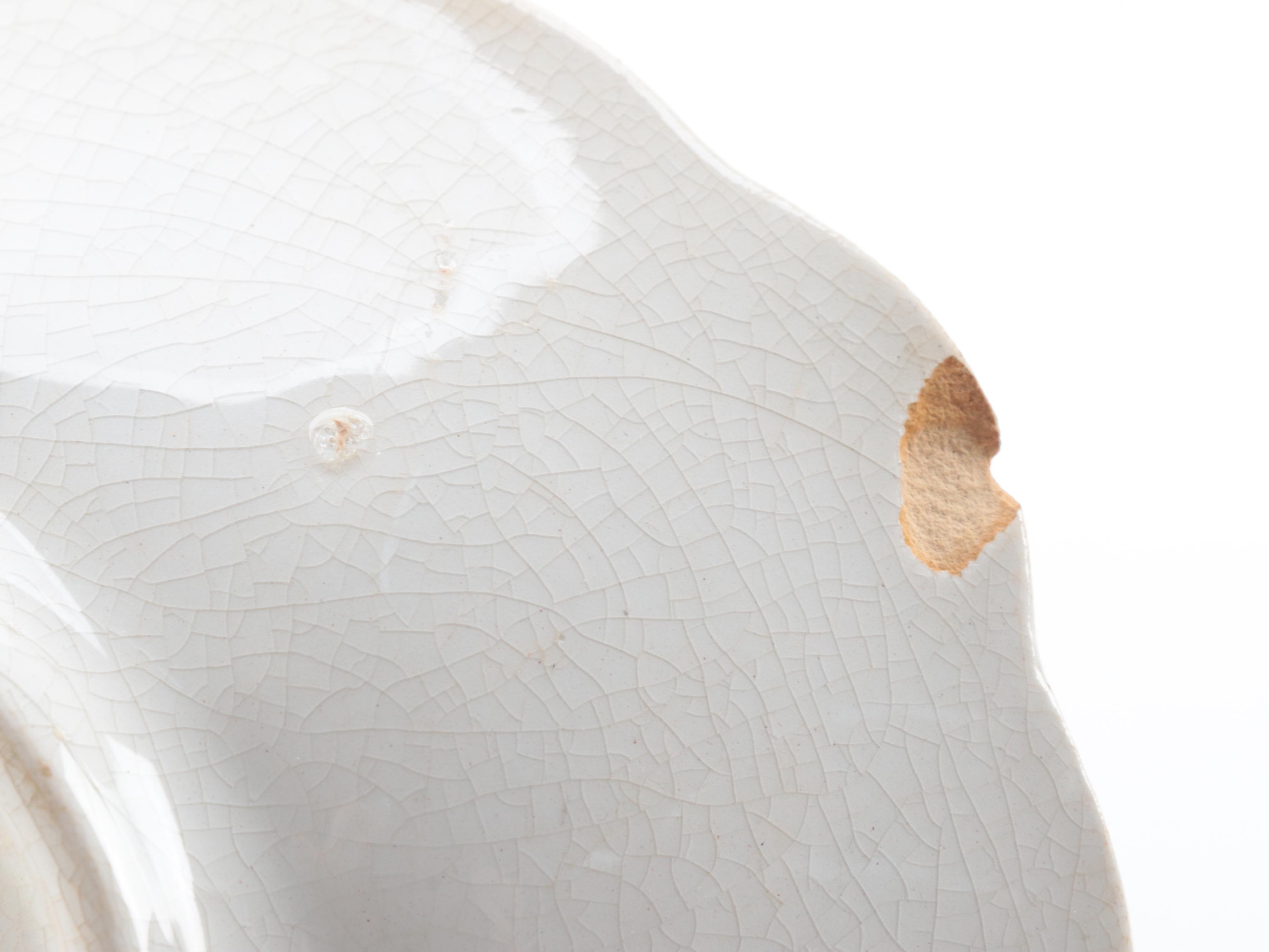 Stinthal China Celery Dish with Brass Chambersticks and Utensils