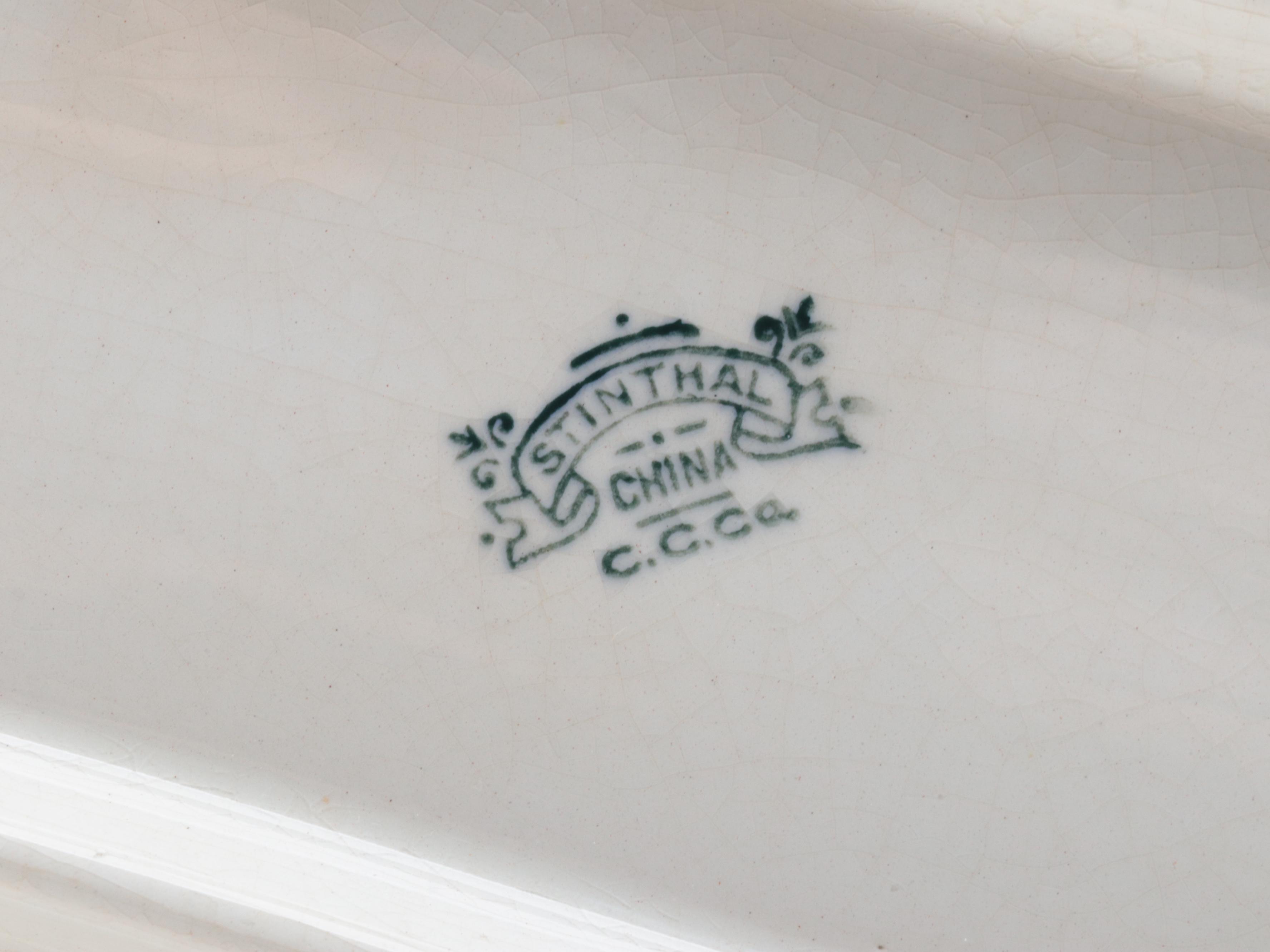 Stinthal China Celery Dish with Brass Chambersticks and Utensils