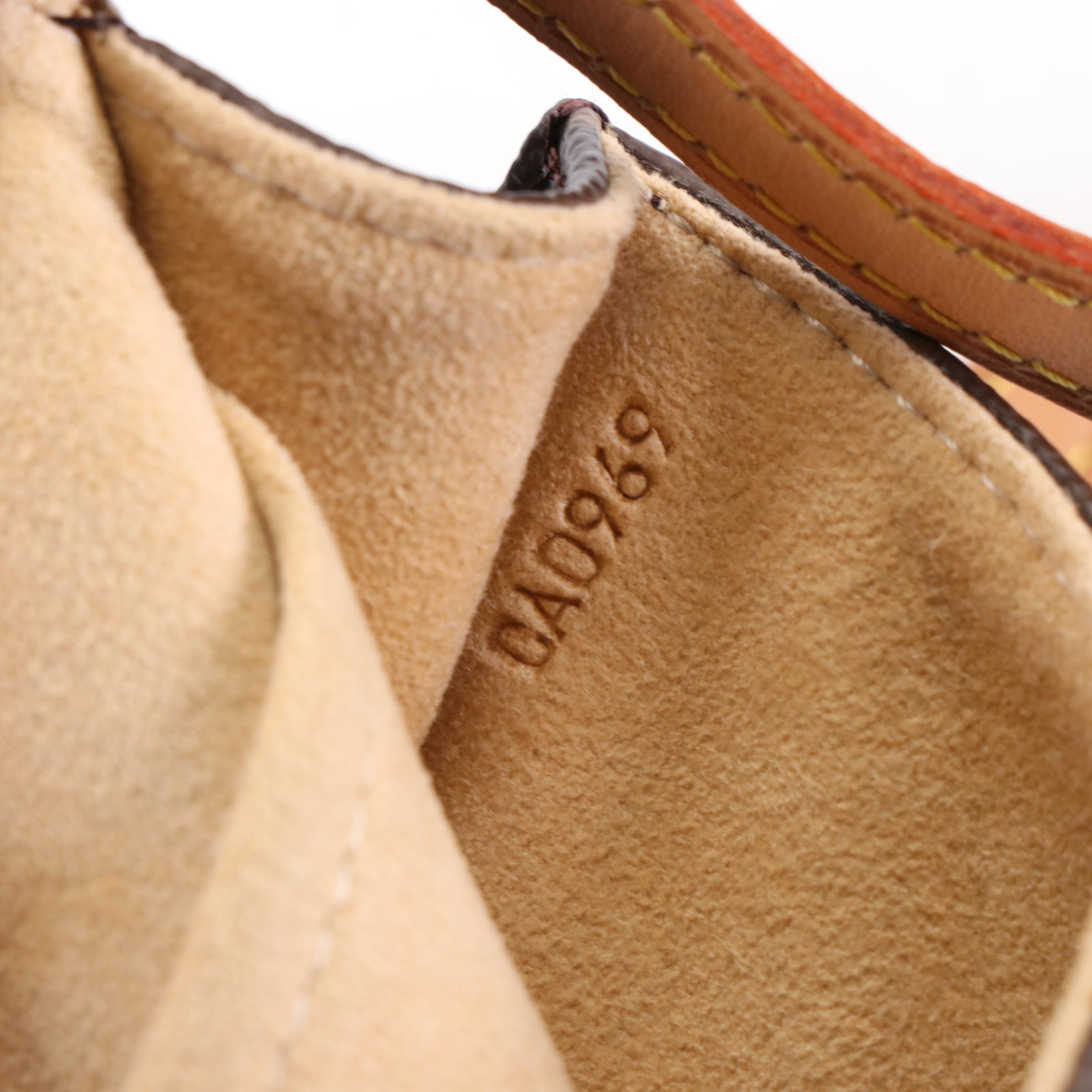 Louis Vuitton Pochette Twin GM in Monogram Canvas and Vachetta Leather