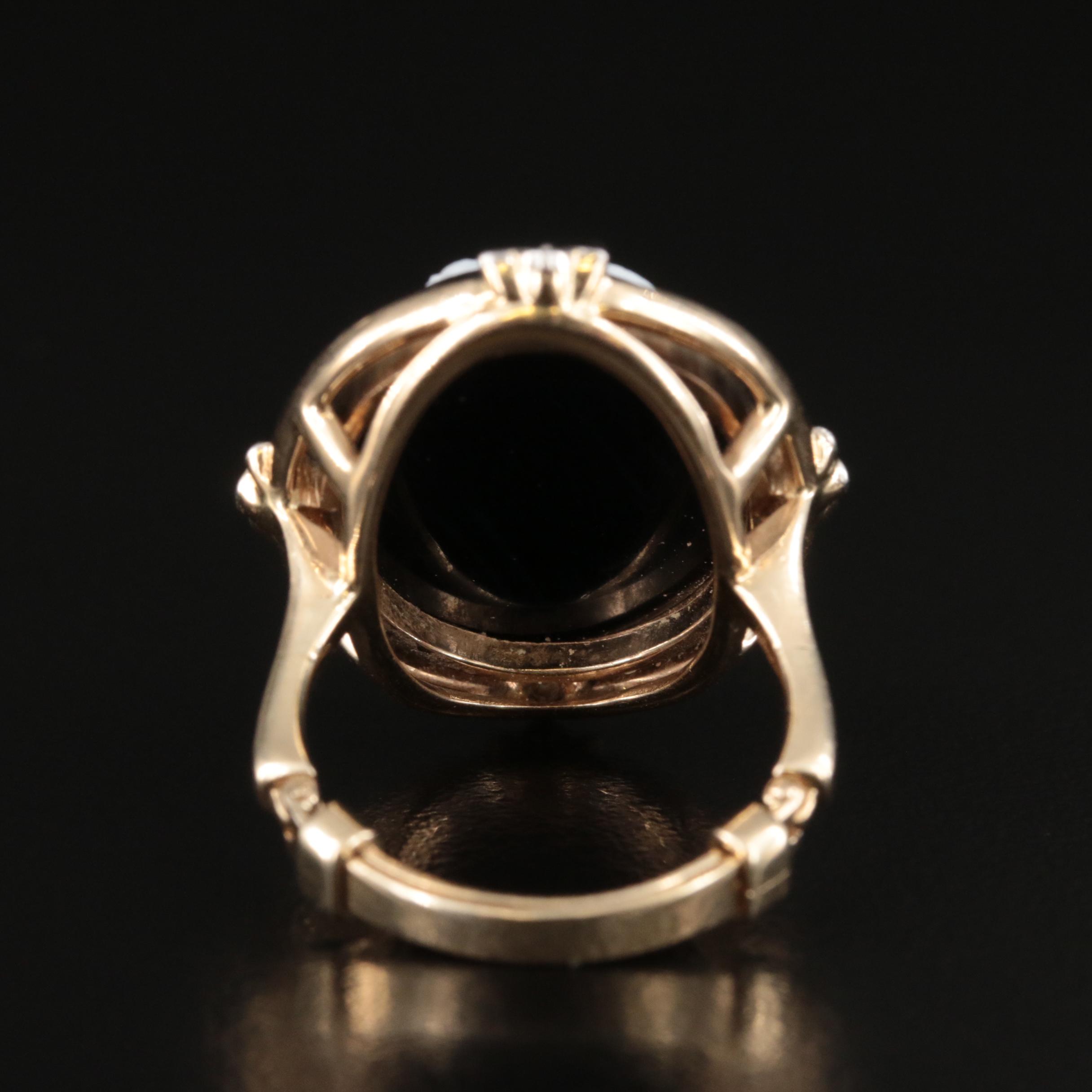Vintage 14K Onyx and Diamond Cameo Ring with Platinum Accents